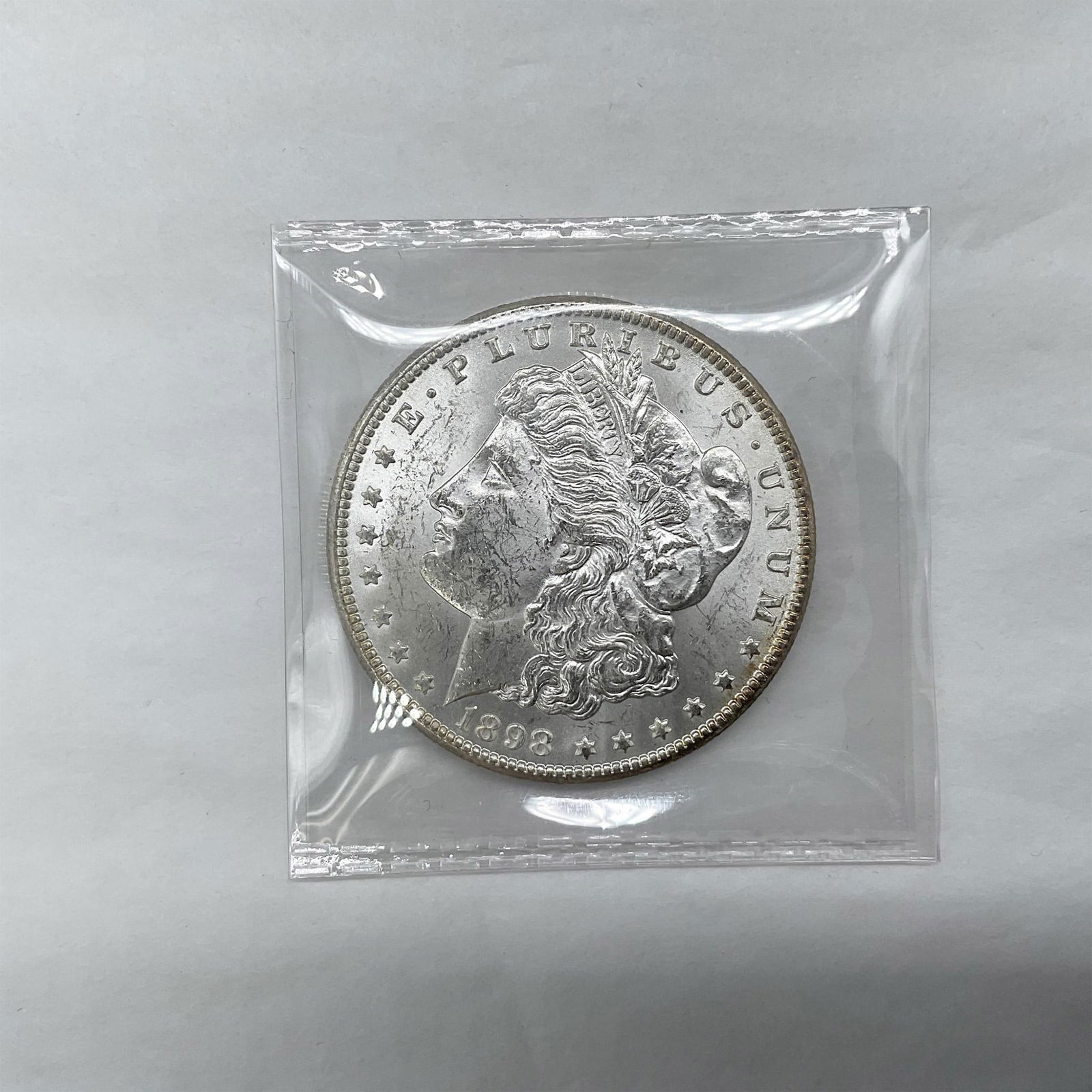 1898-O Morgan Silver Dollar Uncirculated (1 of 3)