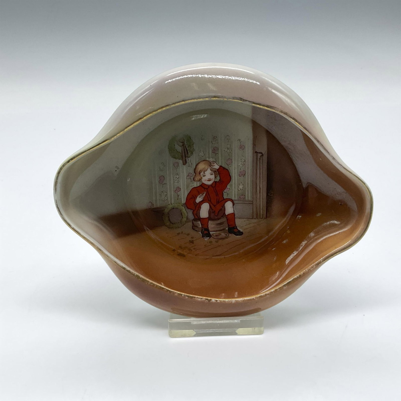 Royal Bayreuth Porcelain Trinket Dish, Little Jack Horner: Hand painted nursery rhyme dishes. Colored in brown, red, and green. Royal Bayreuth backstamp. Issued: 20th century Dimensions: 4.75"L x 4.25"W x 1"H Manufacturer: Royal Bayreuth Country of Origin: Ge