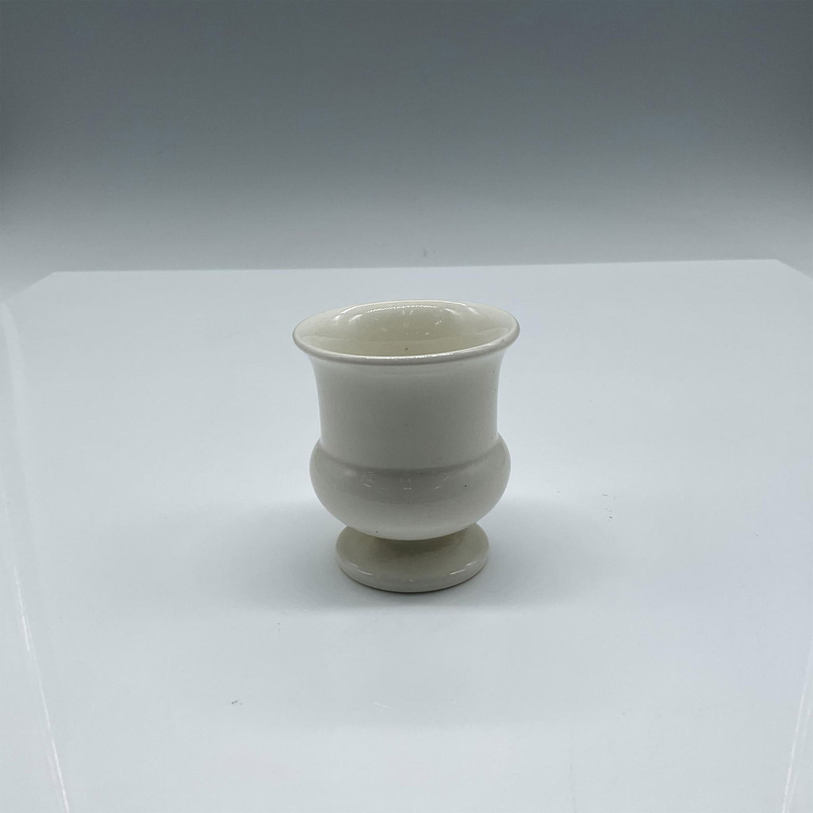 Wedgwood Porcelain White Egg Cup: Glossy urn styled pedestal cup. Wedgwood Barlaston England backstamp. Issued: 20th century Dimensions: 2.5"H x 2" dia. Manufacturer: Wedgwood Country of Origin: England