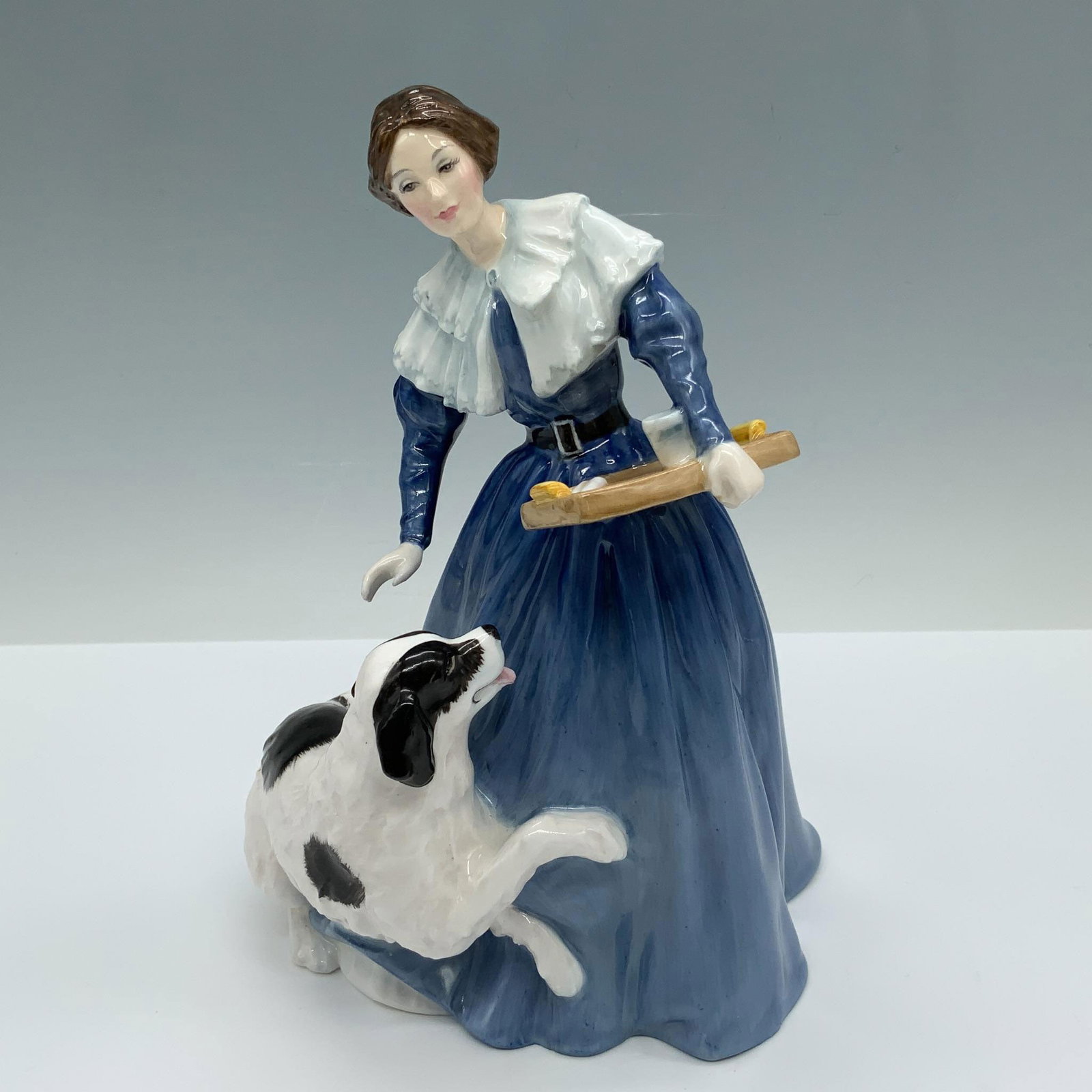 Jane Eyre HN3842 - Royal Doulton Figurine: Limited edition handmade and hand decorated glossy figure from the Literary Heroines Series that features the title character of the Gothic novel by Charlotte Bronte in a depiction of one of the scene