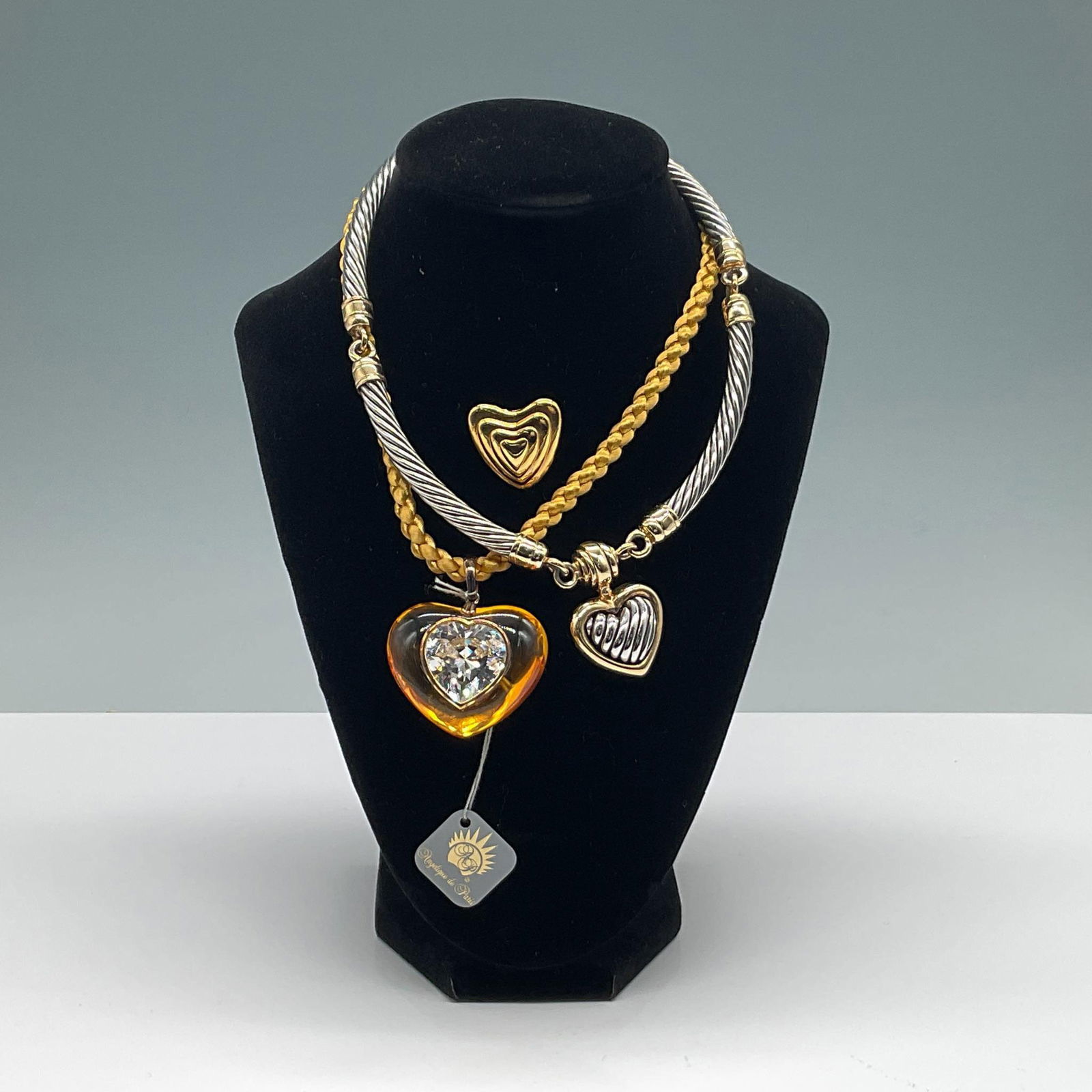 3pc Vintage Heart Jewelry, Necklaces and Escada Pin: A collection of three vintage heart-themed jewelry pieces, including two necklaces and one Escada heart-shaped pin/brooch. The first necklace features a twisted silver-tone cable design with gold-tone