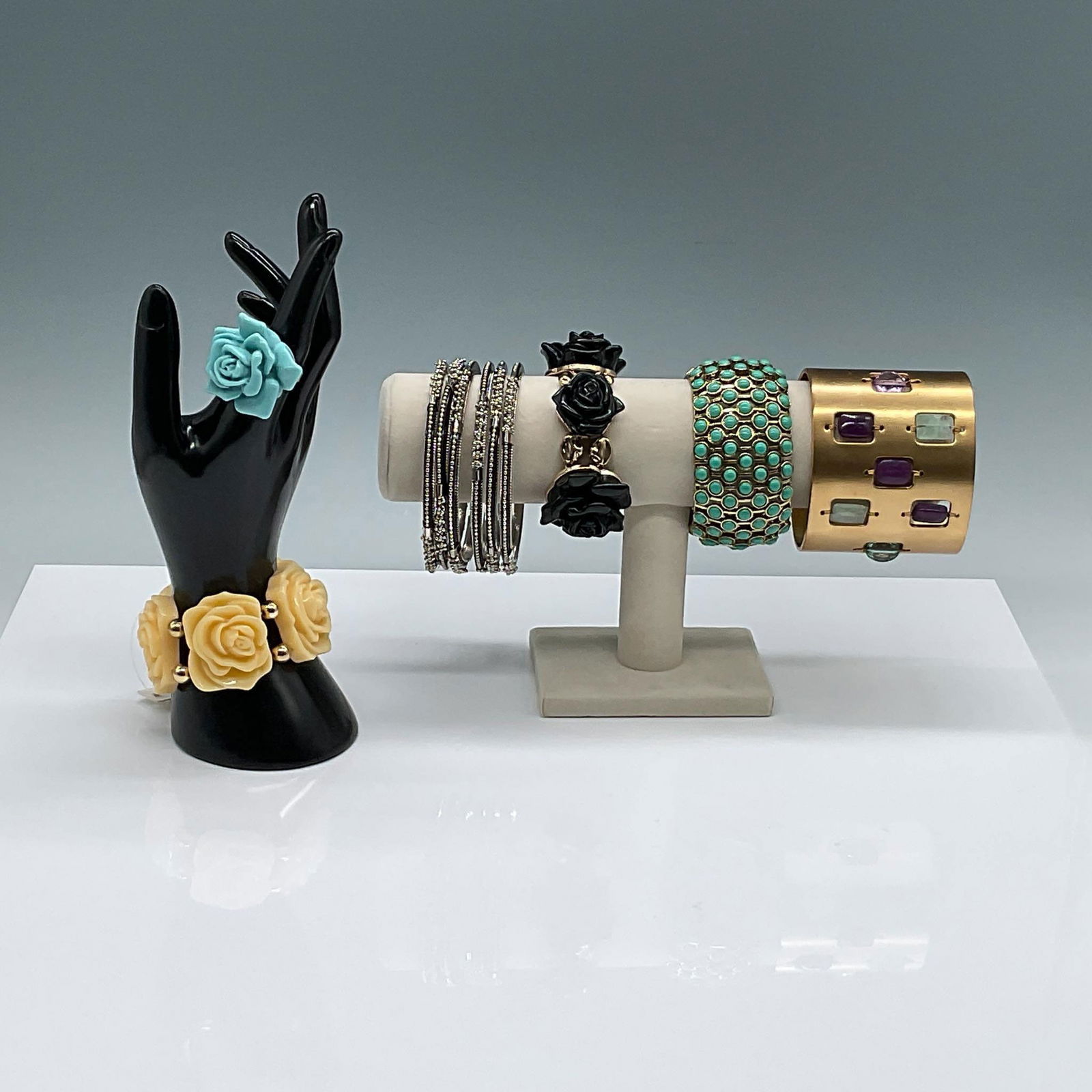 11pc Assorted Fashion Jewelry Lot, Bracelets and Ring: This lot features an 11-piece collection, including 2 statement cuff bracelets: one wide gold-tone cuff with multicolored rectangular stones measuring 3"W x 2.25"H, and another gold-tone cuff with tur