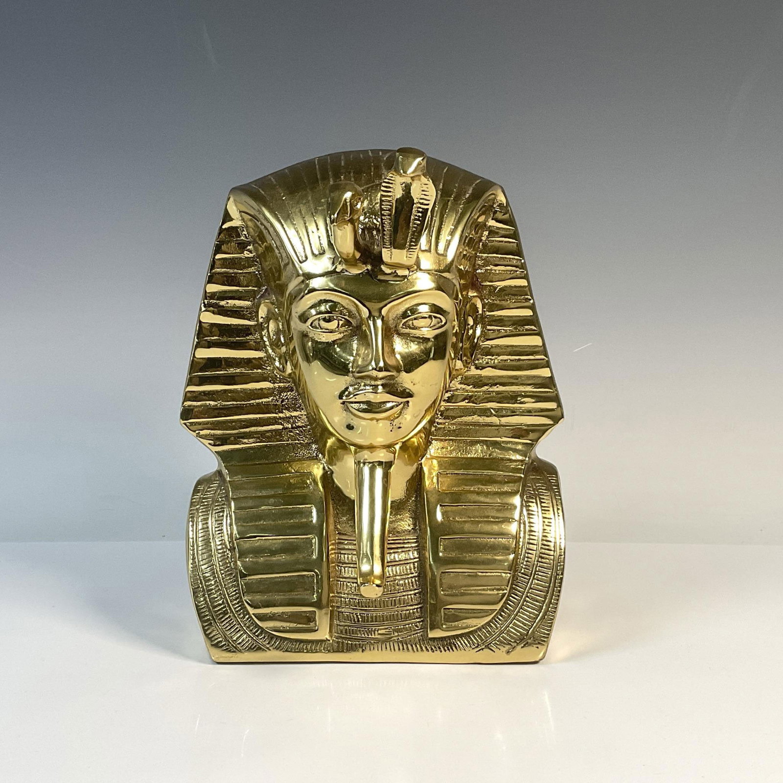 Egyptian Revival Metal Bust of King Tut: Well done solid bust of the famous Pharaoh of Egypt, King Tut. Dimensions: 7.5"L x 7"W x 10"H