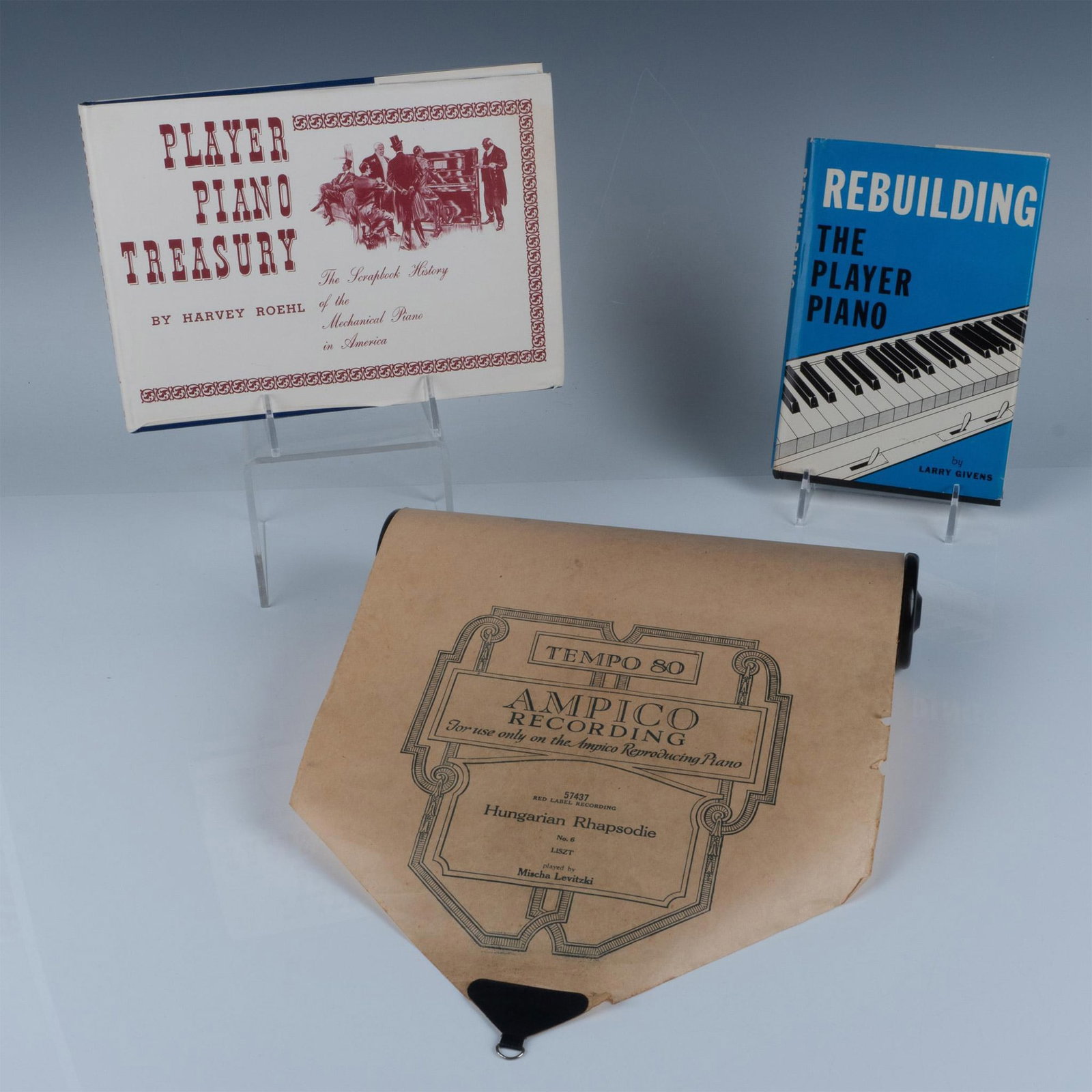 3pc Player Piano Books & Roll: Fantastic antiquated collection of piano player collectables that includes a comprehensive guide to restoring and maintaining player pianos called Rebuilding The Player Piano by Larry Givens that is s