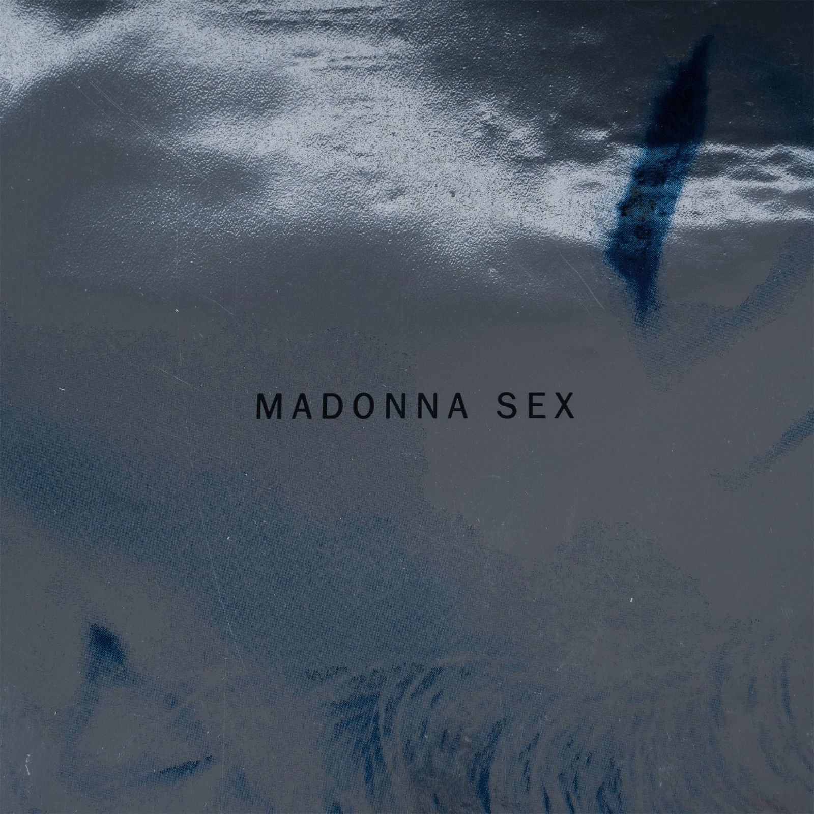 Madonna Sex Book 1st Printing w/ Foil Cover, Packaged Sealed: A factory-sealed first edition copy of the 1992 coffee table book Sex, written by American singer Madonna. Photography by American fashion photographer Steven Meisel and French director, art director,