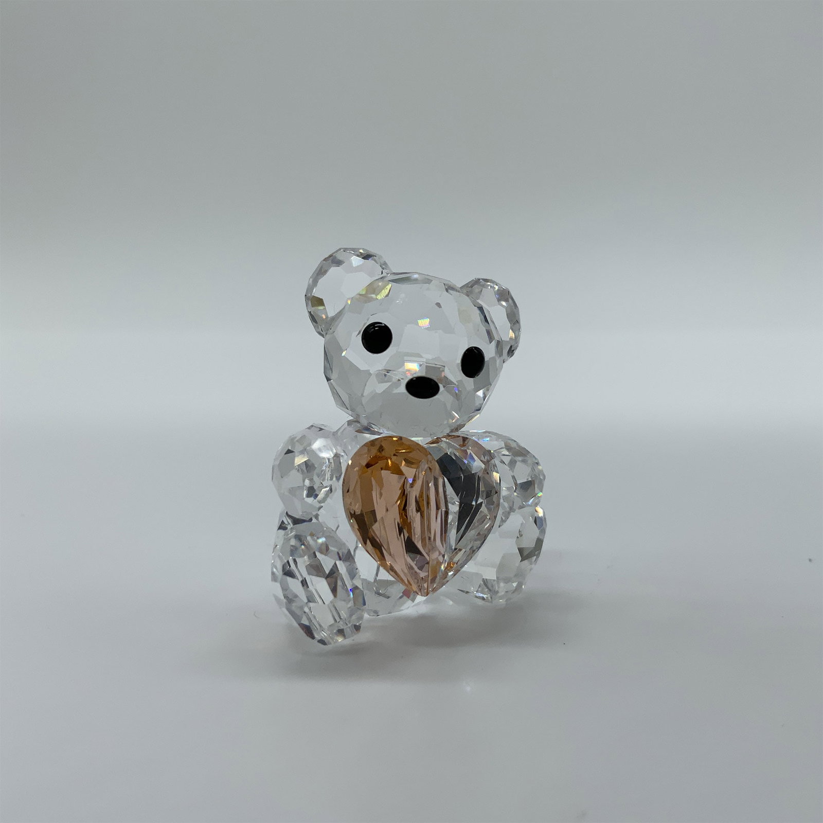 Swarovski Crystal Figurine, From The Heart Kris Bear: This charming Swarovski crystal figurine, From The Heart Kris Bear, was a limited edition release. Designed by Heinz Tabertshofer, the bear is crafted from clear crystal with jet-black eyes and nose, 