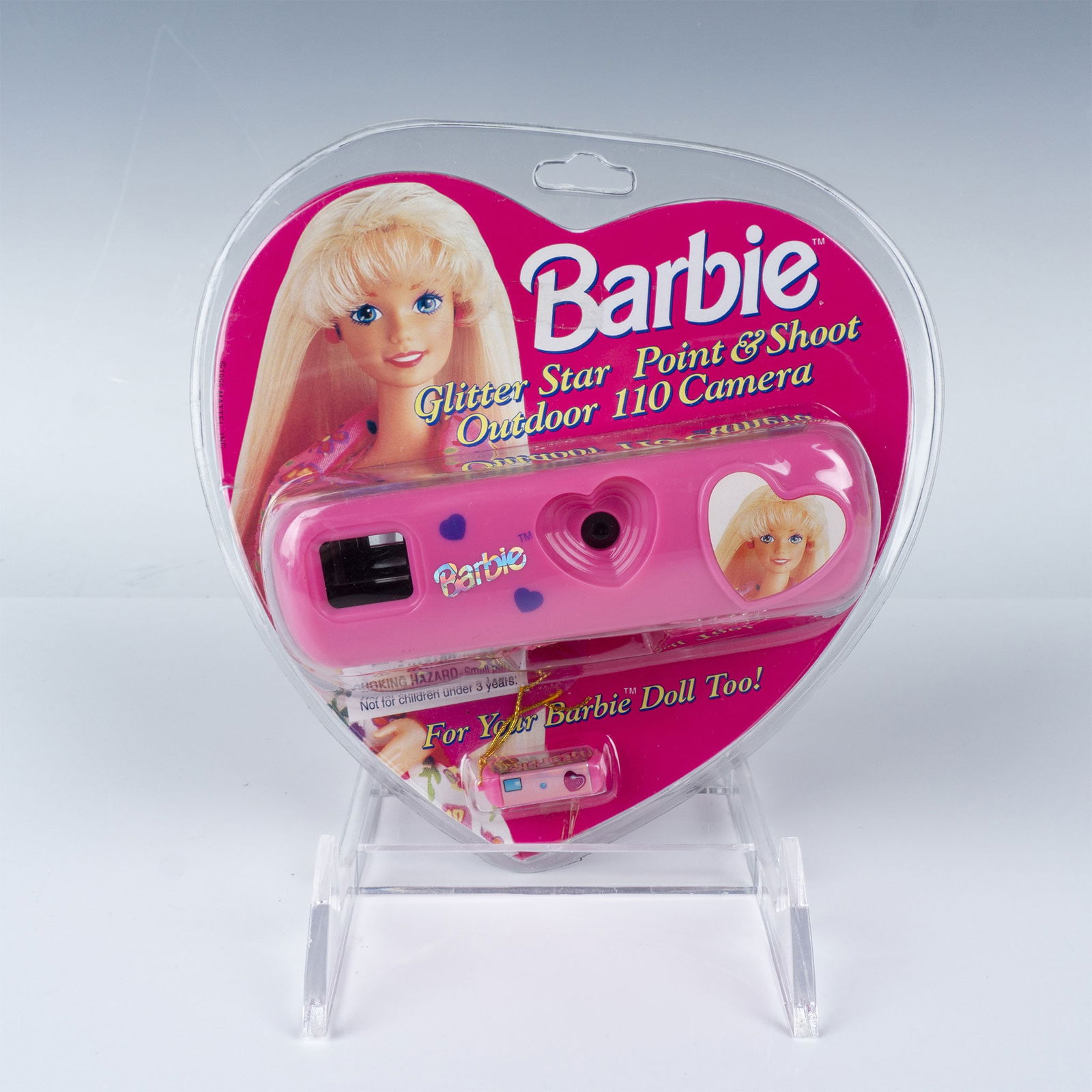 Barbie Glitter Star Point & Shoot Outdoor 110 Camera: Mattel Barbie Glitter Star Point & Shoot Outdoor 110 Camera in original heart-shaped packaging. Made by Kalimar Inc. in 1995 under license from Mattel. Features a pink design with glitter details and