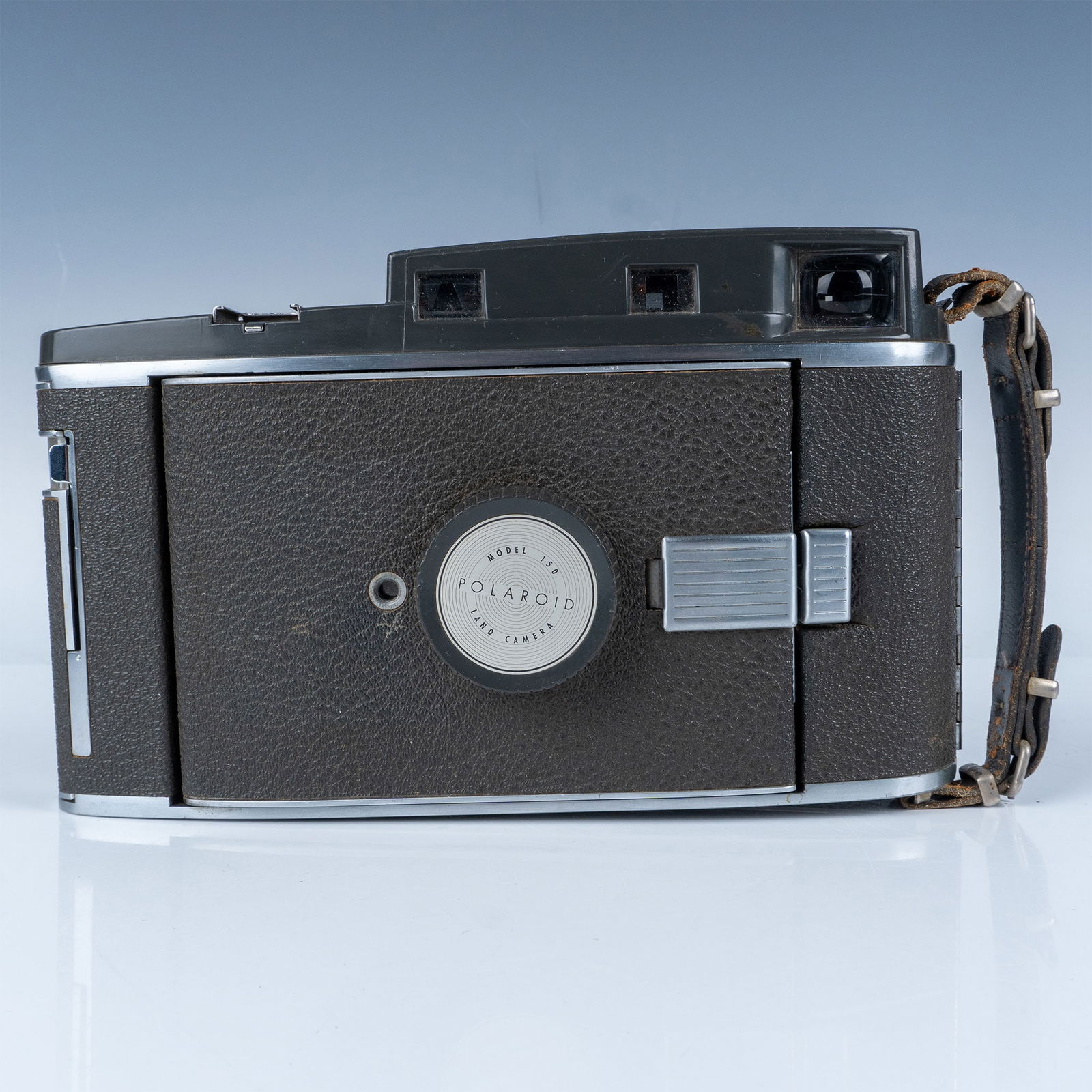 Polaroid Land Camera Model 150: A premium instant camera introduced by Polaroid in the 1950s. Known for its advanced design, the Model 150 features a metal body wrapped in leatherette, a bellows system for focusing, and a sophistica