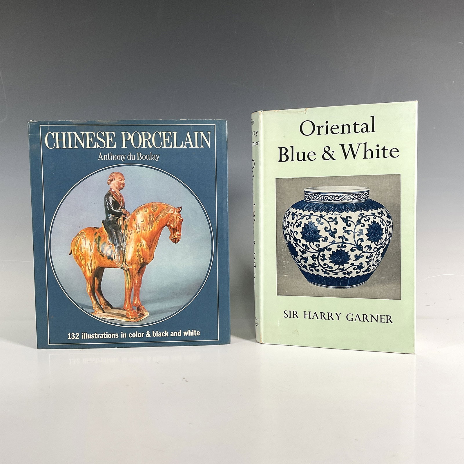 2 Assorted Non Fiction Books on Chinese Porcelain: Various related subjects, including Sir Harry Garner: Oriental Blue & White, and Anthony du Boulay: Chinese Porcelain. Largest book measures 8.25"L x 0.75"W x 9.75"H. Issued: 1964-1973 Dimensions: See