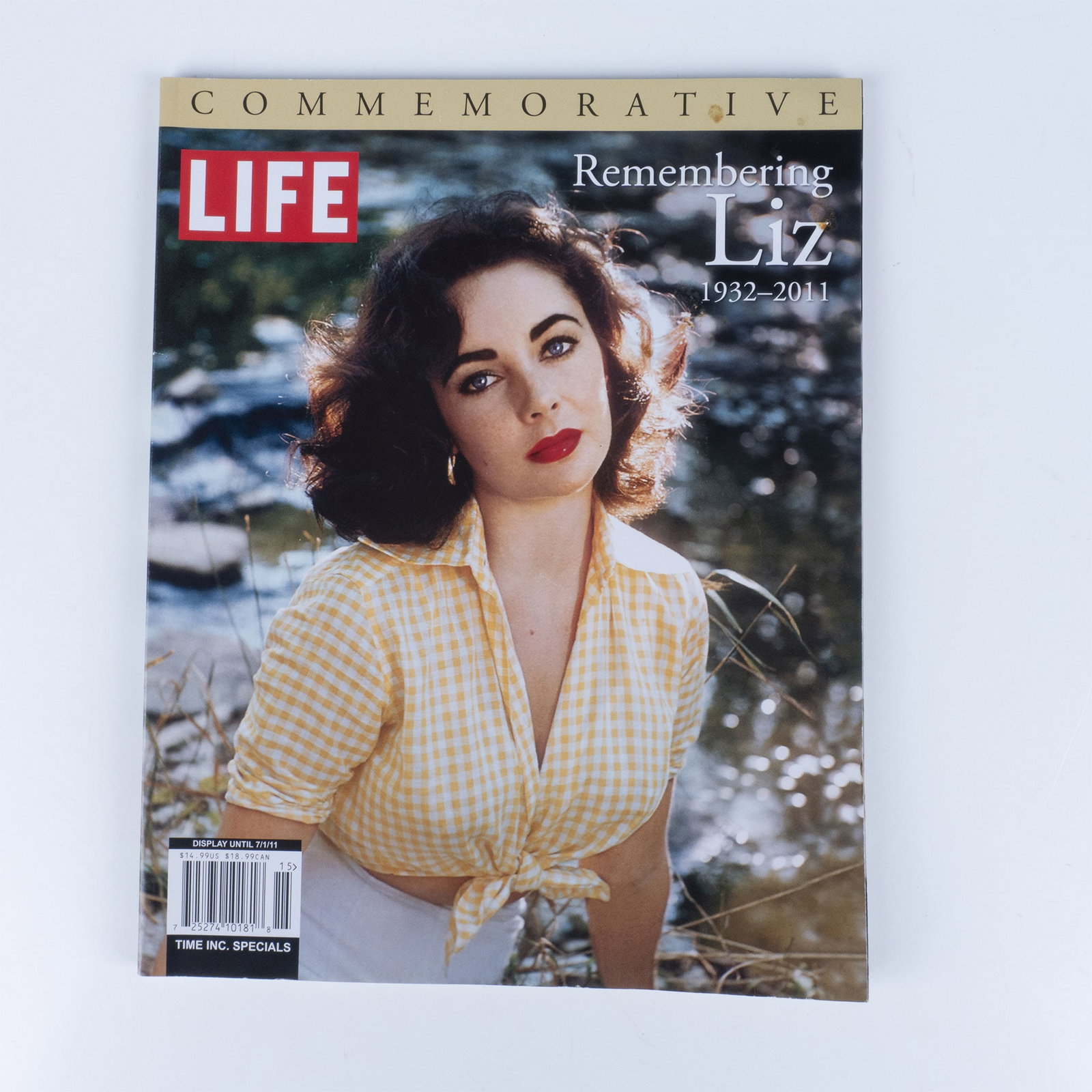Life Magazine, Life Remembering Liz: 1932-2011: 96 page paperback book, offering a tribute to the iconic actress, philanthropist, and living legend Elizabeth Taylor. It features a collection of memorable photographs, articles, and essays that highl