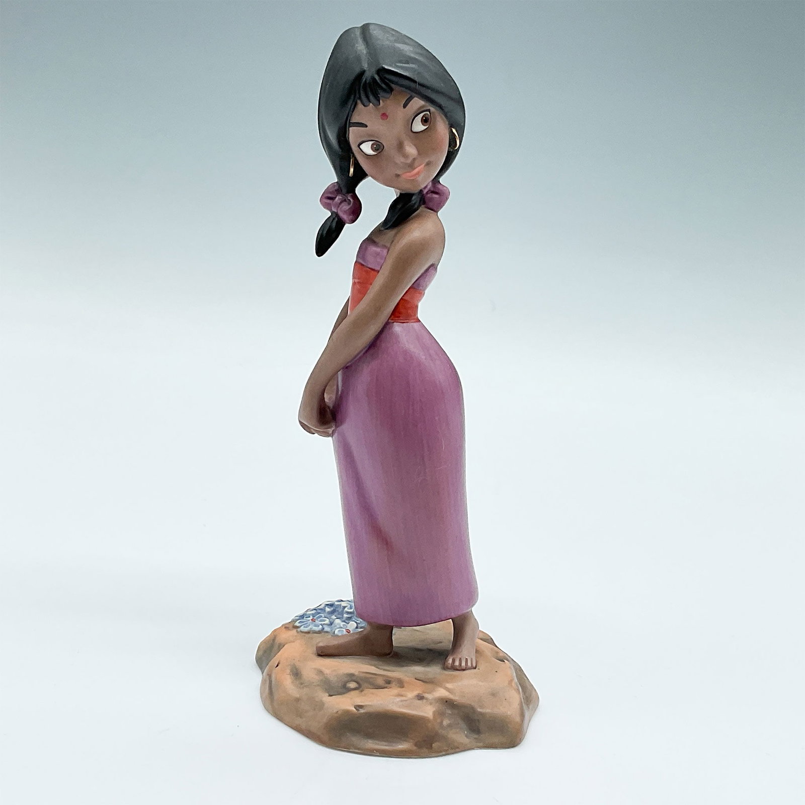 Walt Disney Classics Collection Figurine, Coy Smile: Walt Disney Classics Collection figurine titled "Coy Smile," depicting the Village Girl from The Jungle Book. This 5.5"H figurine features exceptional craftsmanship and vibrant hand-painted details. P