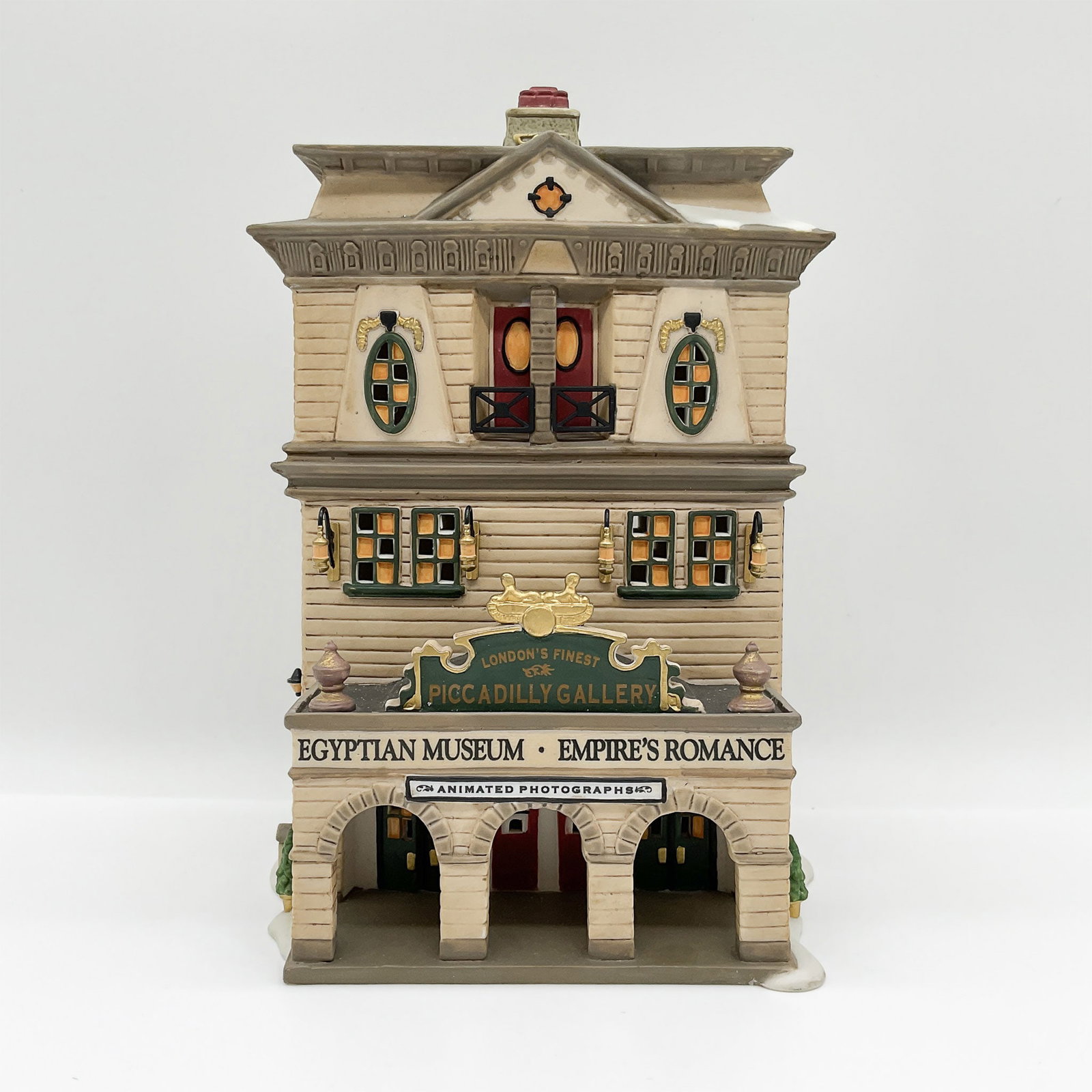 Department 56 Dickens Village Piccadilly Gallery Figurine: The Department 56 Piccadilly Gallery is a stunning addition to the Dickens Village Series celebrating the charm and architecture of Victorian-era London. Introduced in 2001, this piece captures the gr