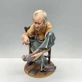 Capodimonte Porcelain Figurine, Man Sewing His Sock