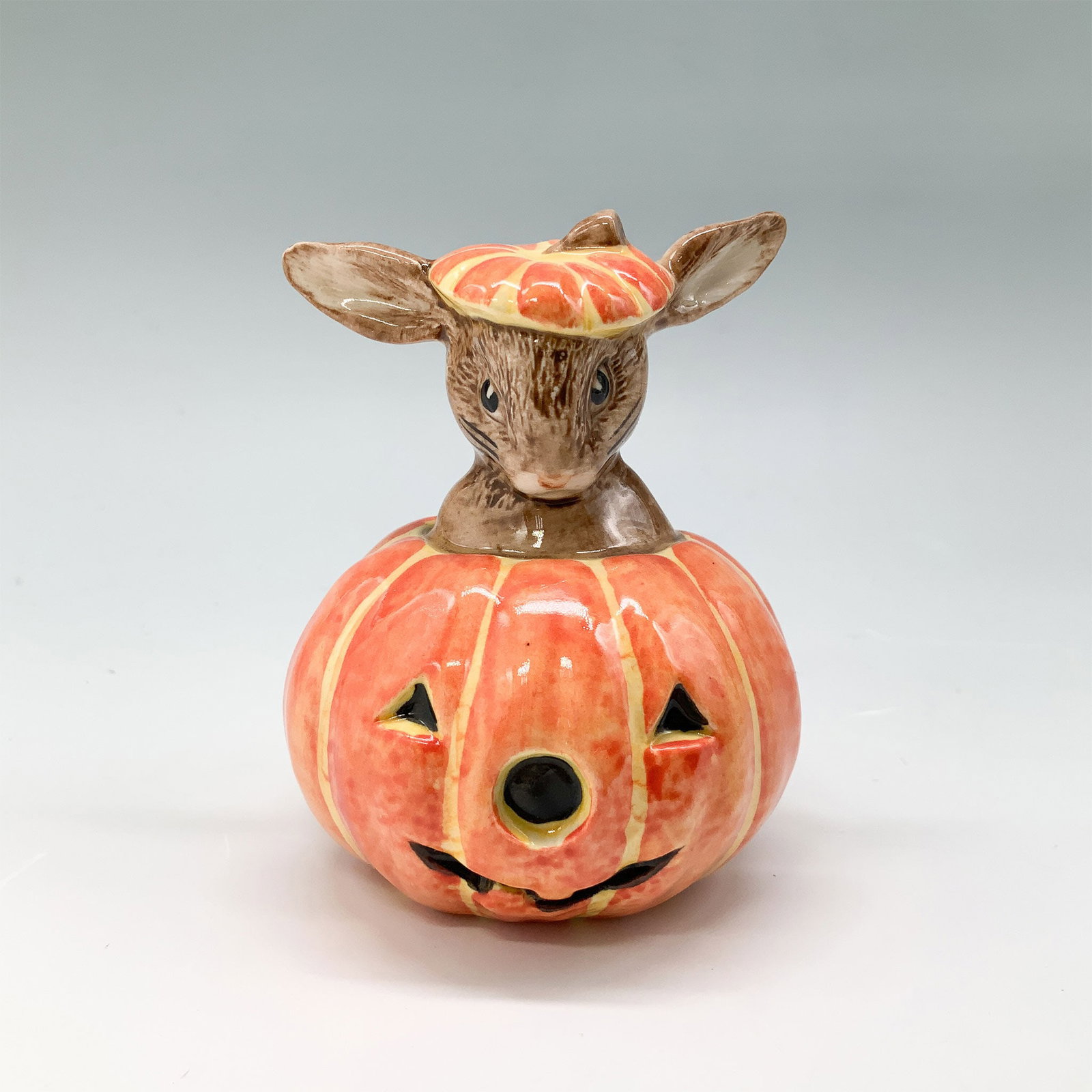Royal Doulton Bunnykins Figurine, Halloween DB122 w/ Box: Royal Doulton Bunnykins fine bone china figurine titled Halloween DB122. This charming piece features a Bunnykins character inside a pumpkin jack-o-lantern design. The underside bears the Royal Doulto