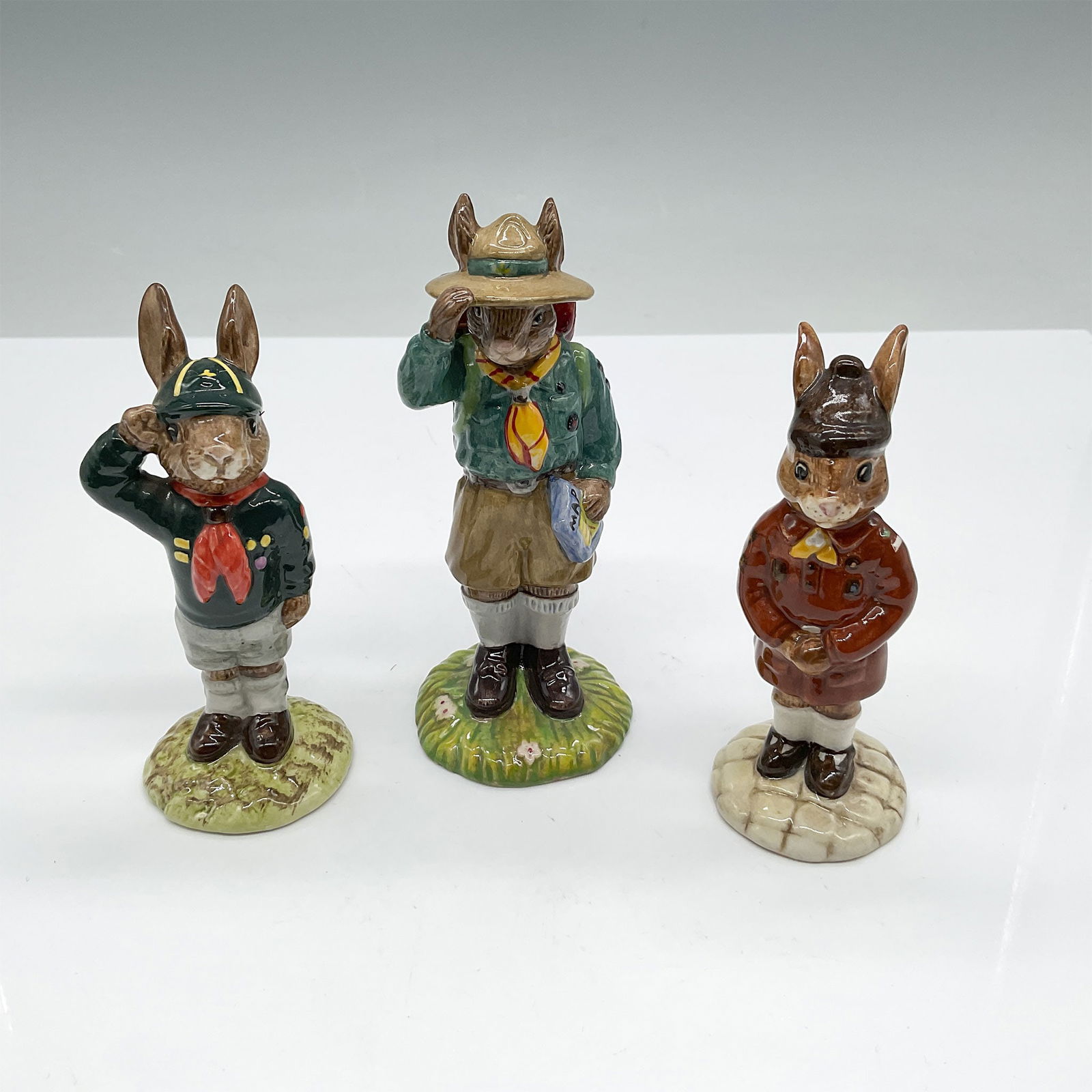 3pc Royal Doulton Bunnykins Figurines, Boy Scouts: This charming set of three Royal Doulton Bunnykins figurines features adorable Scout-themed bunnies, each beautifully hand-made and hand-decorated. The figurines include: "Be Prepared Bunnykins" DB56