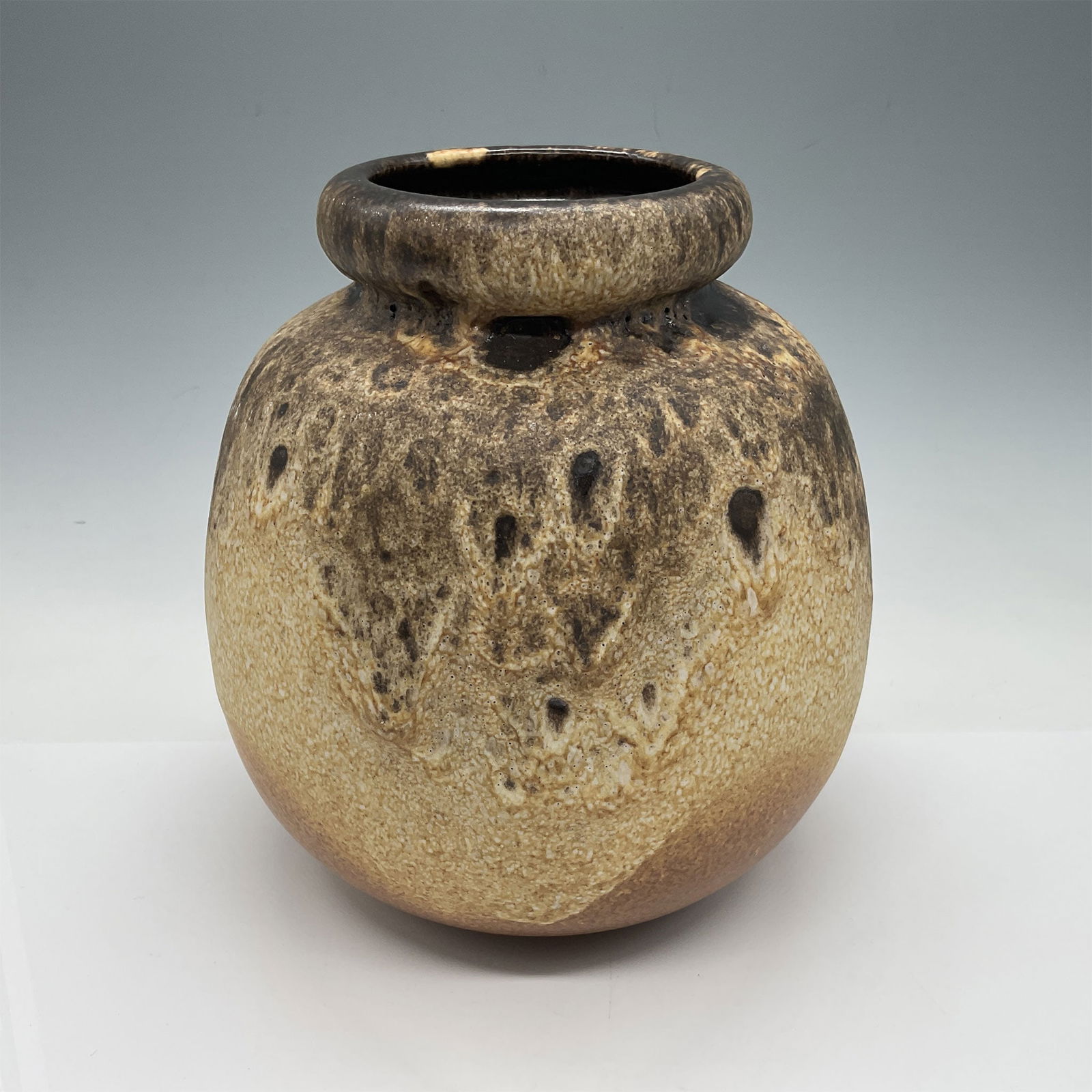 Vintage West German Scheurich Keramik Vase 284-19: A vintage West German Scheurich Keramik pottery vase, marked "W. Germany 284-19" on the underside. This mid-century piece features a rounded form with an earthy brown glaze showcasing flowing and mott