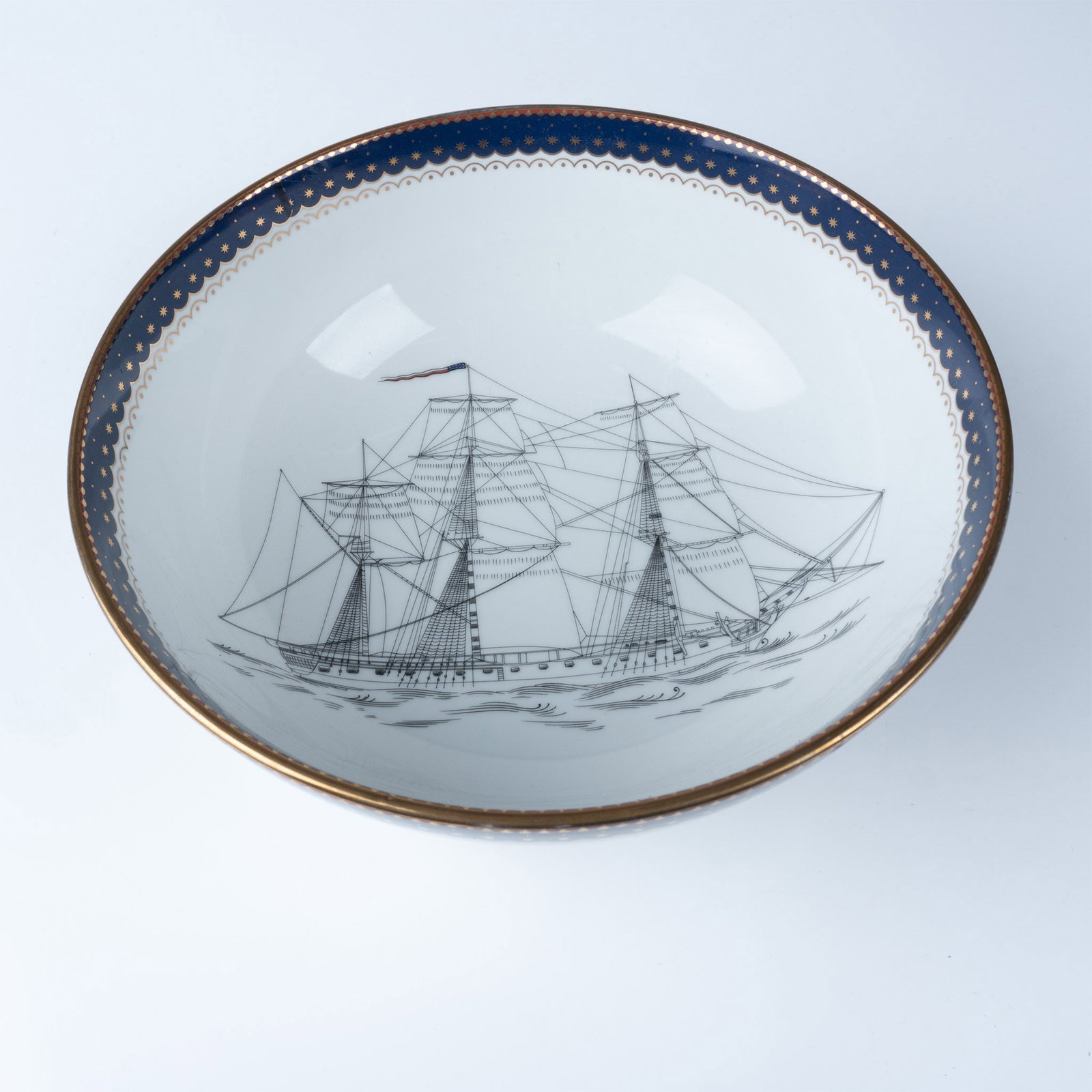 Andrea by Sadek Navy Museum Truxtun Bowl: A stunning reproduction of the Truxtun Bowl from the Navy Museum, crafted by Andrea by Sadek. This porcelain bowl features an intricate depiction of a naval ship on the interior, framed by an elegant 