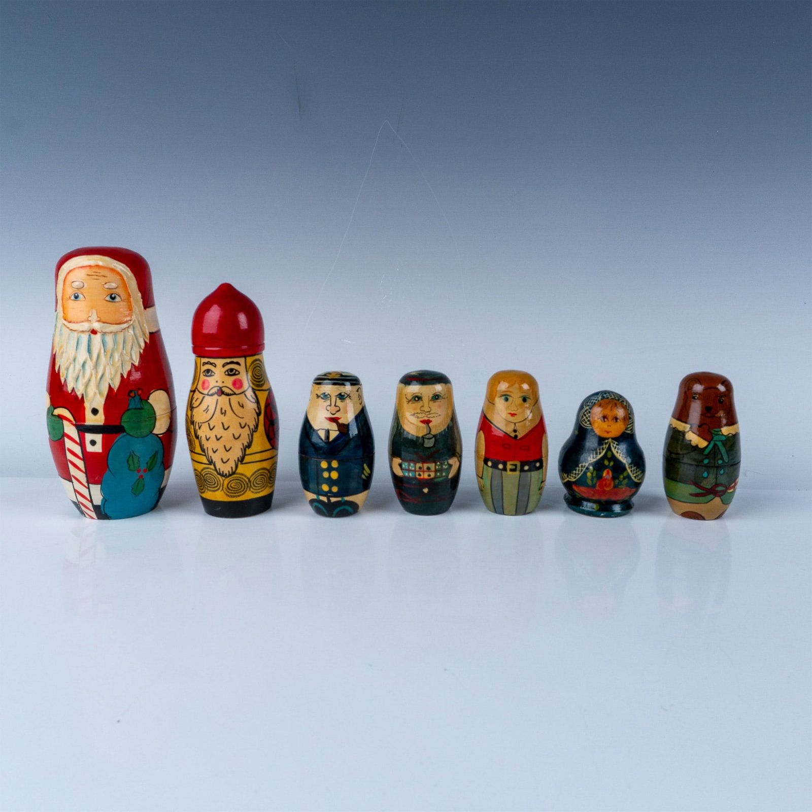 7 Sets of Hand-Painted Wooden Nesting Dolls (1 of 4)