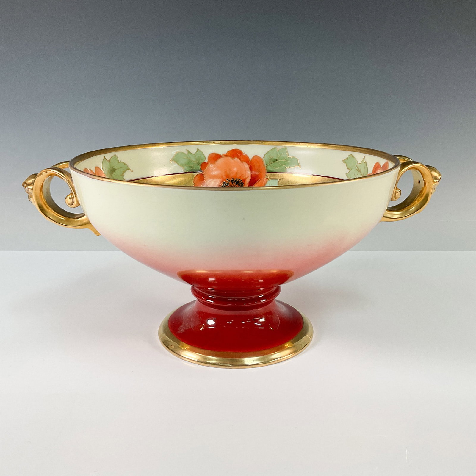 Rosenthal by Howard Reury Poppy Design Centerpiece Bowl: Exquisite Rosenthal porcelain centerpiece bowl designed by Howard Reury, featuring a striking hand-painted floral motif with vibrant orange poppies and lush green foliage. The interior is adorned with
