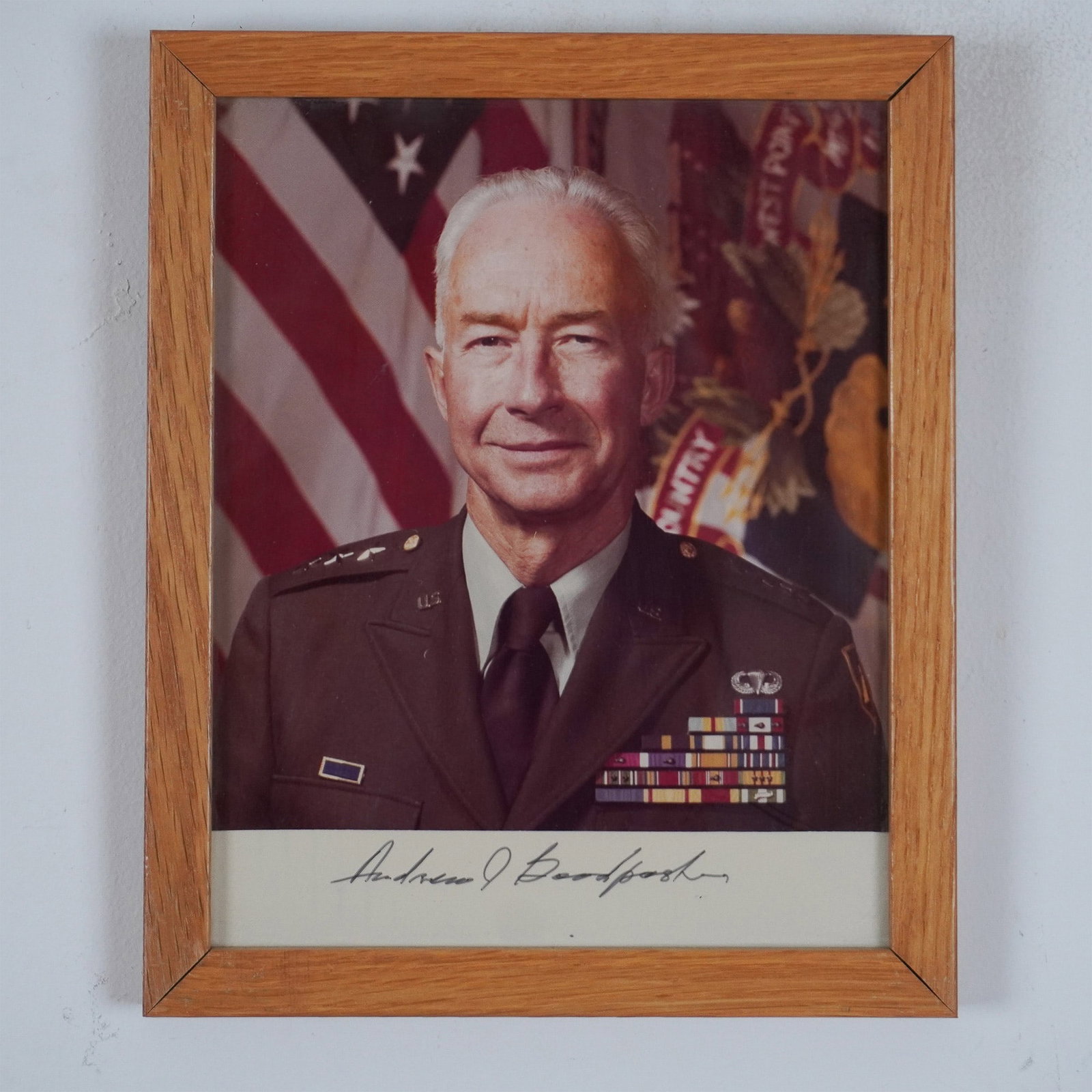 Autographed B&W Photograph of General Andrew J. Goodpaster: This autographed black and white photograph features General Andrew J. Goodpaster, renown for his exceptional strategic acumen and leadership in various roles, including as the Supreme Allied Commande