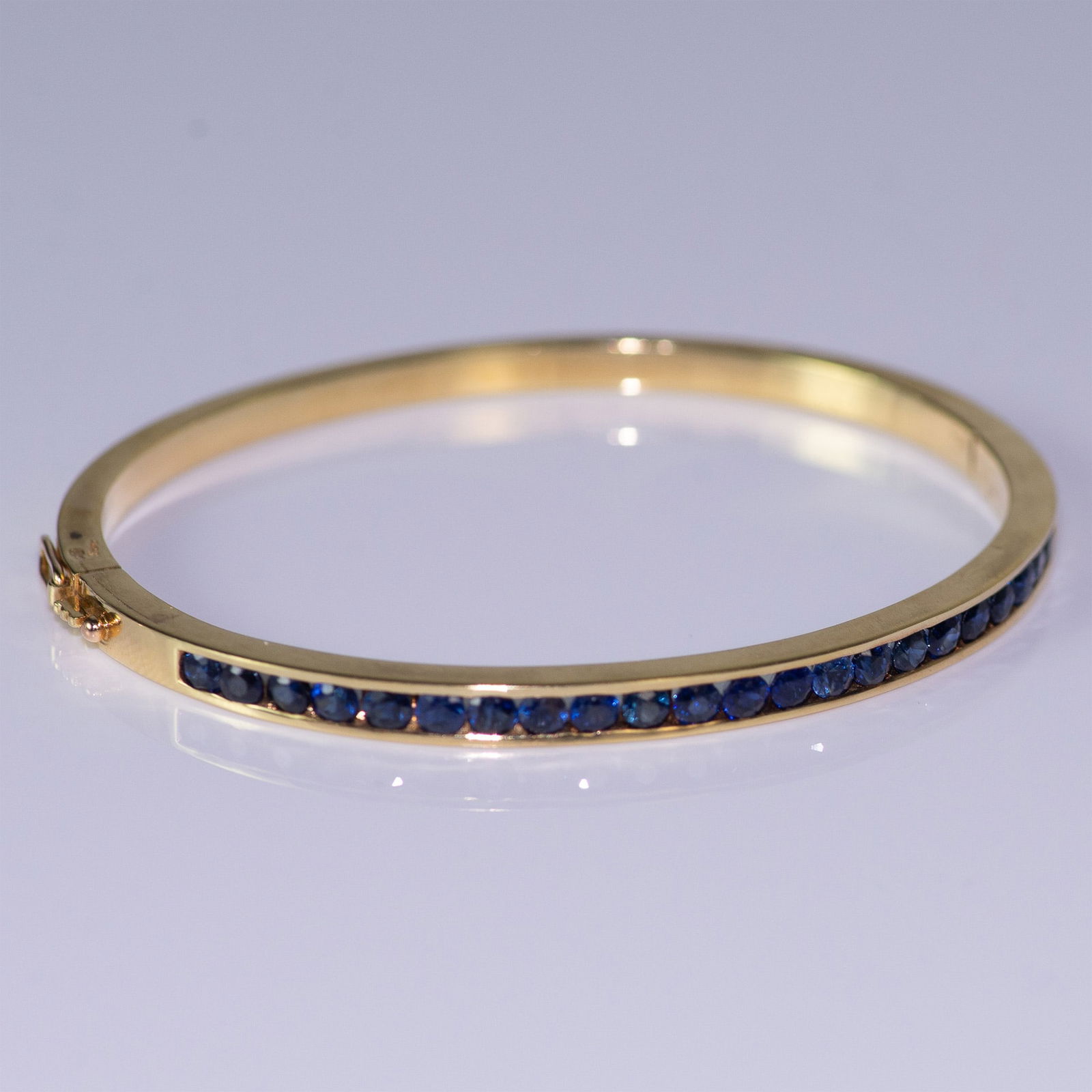 Contemporary 18K Gold and Blue Sapphire Bracelet (1 of 9)