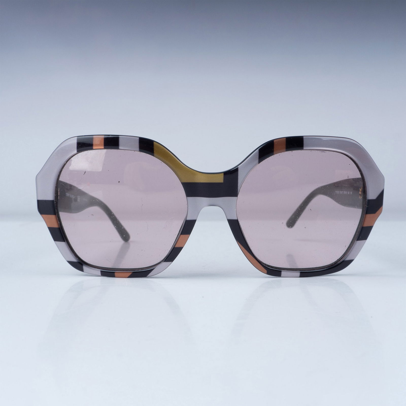 Tory Burch Sunglasses with Case, TY7120 1730/1T: Stylish Tory Burch oversized sunglasses featuring a bold striped frame in pink, yellow, black, and orange tones with gradient lenses. Model TY7120 1730/1T, measuring 57-18-140, crafted with signature