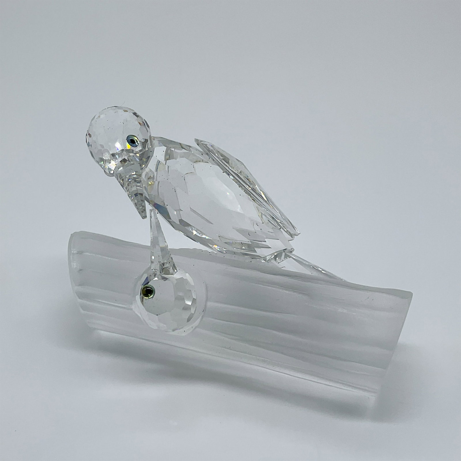 Swarovski 1988 Annual Edition Woodpeckers Sharing Figurine: This exquisite Swarovski figurine, ?Woodpeckers ? Sharing,? is the 1988 Annual Edition created exclusively for SCS members. It belongs to the "Caring and Sharing" trilogy and was designed by Adi Stock