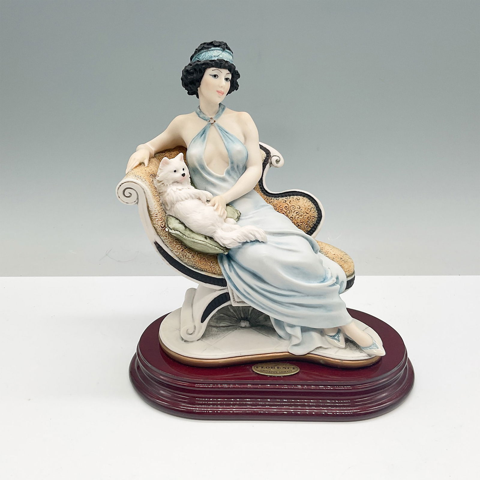 Florence Giuseppe Armani Marianne Figurine: Exquisite Florence figurine designed by renowned Italian sculptor Giuseppe Armani, titled Marianne. This 1990 limited edition piece, produced for The Society, depicts an elegant woman reclining on an