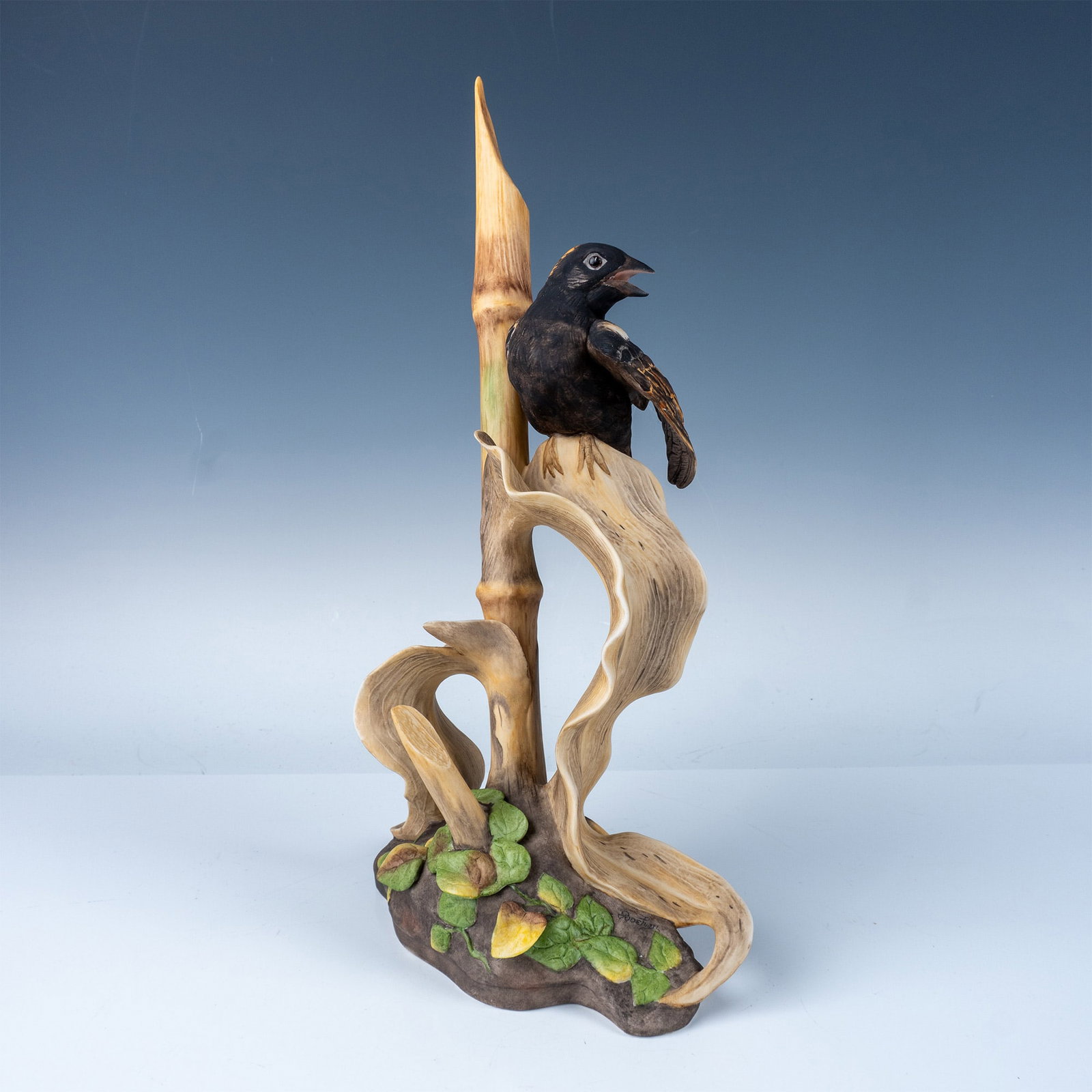 Boehm Porcelain Figurine, Perched Bird on Branch Sculpture: A Boehm porcelain figurine showcasing a meticulously crafted bird perched on a stylized branch. This elegant sculpture exemplifies the fine artistry and craftsmanship that Boehm is renowned for. Boehm