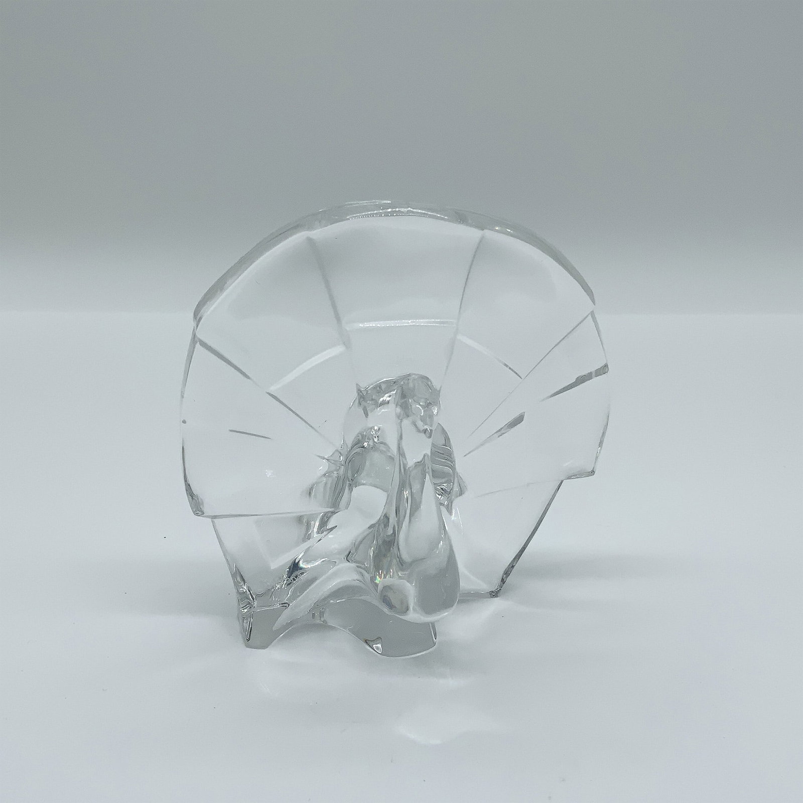 Baccarat Crystal Peacock Figurine: Elegant Baccarat crystal peacock figurine with a beautifully sculpted body and a fanned, faceted tail that reflects light brilliantly. Signed Baccarat on the base. Includes original red box. Issued: 2