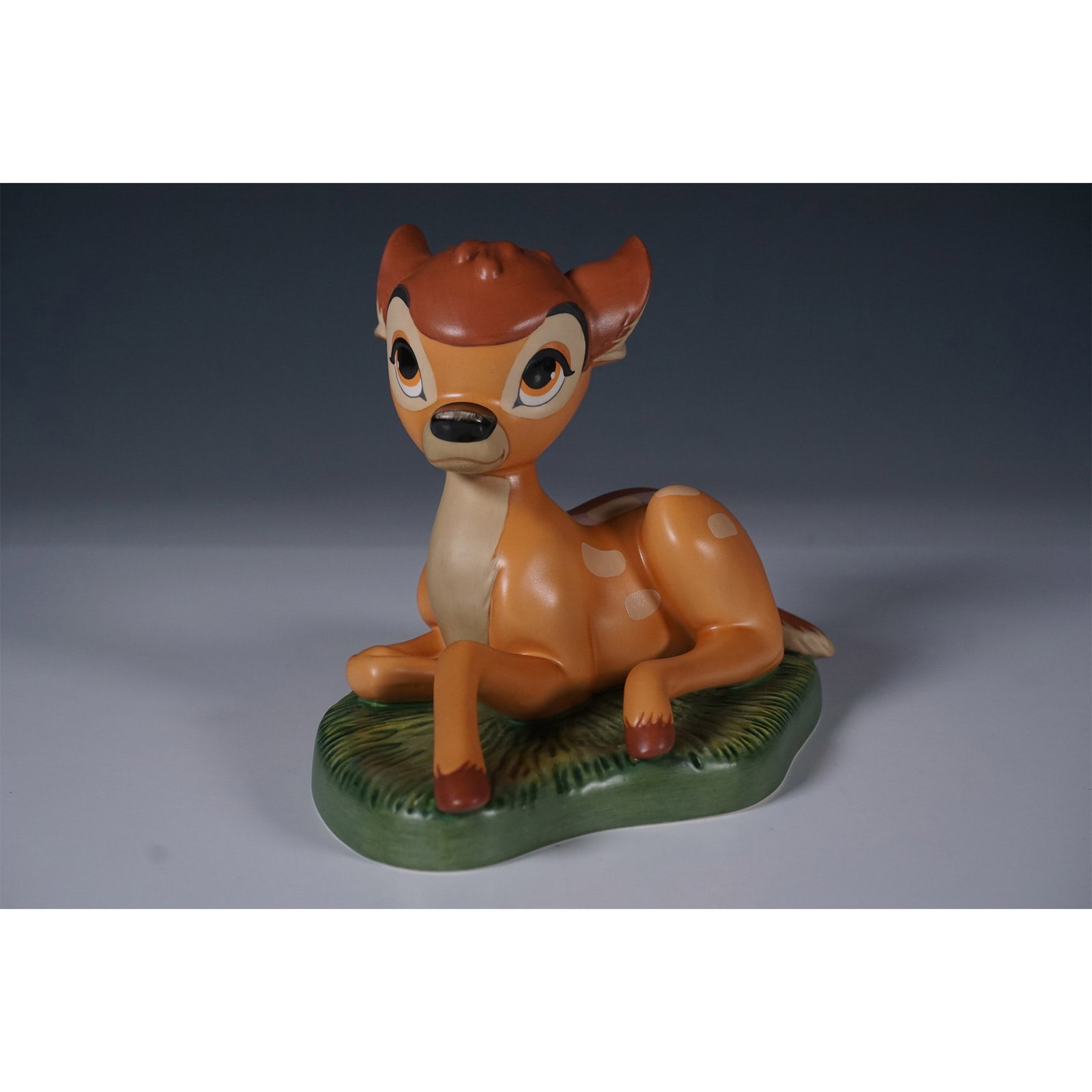 Disney Classics Collection Bambi Figurine, The Young Prince: This Walt Disney Classics Collection figurine, Bambi: The Young Prince, was released in 2004 as a Walt Disney Collectors Society Membership Sculpture. Expertly sculpted by Bruce Lau, this porcelain fi