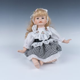 Crying Porcelain Sitting Doll