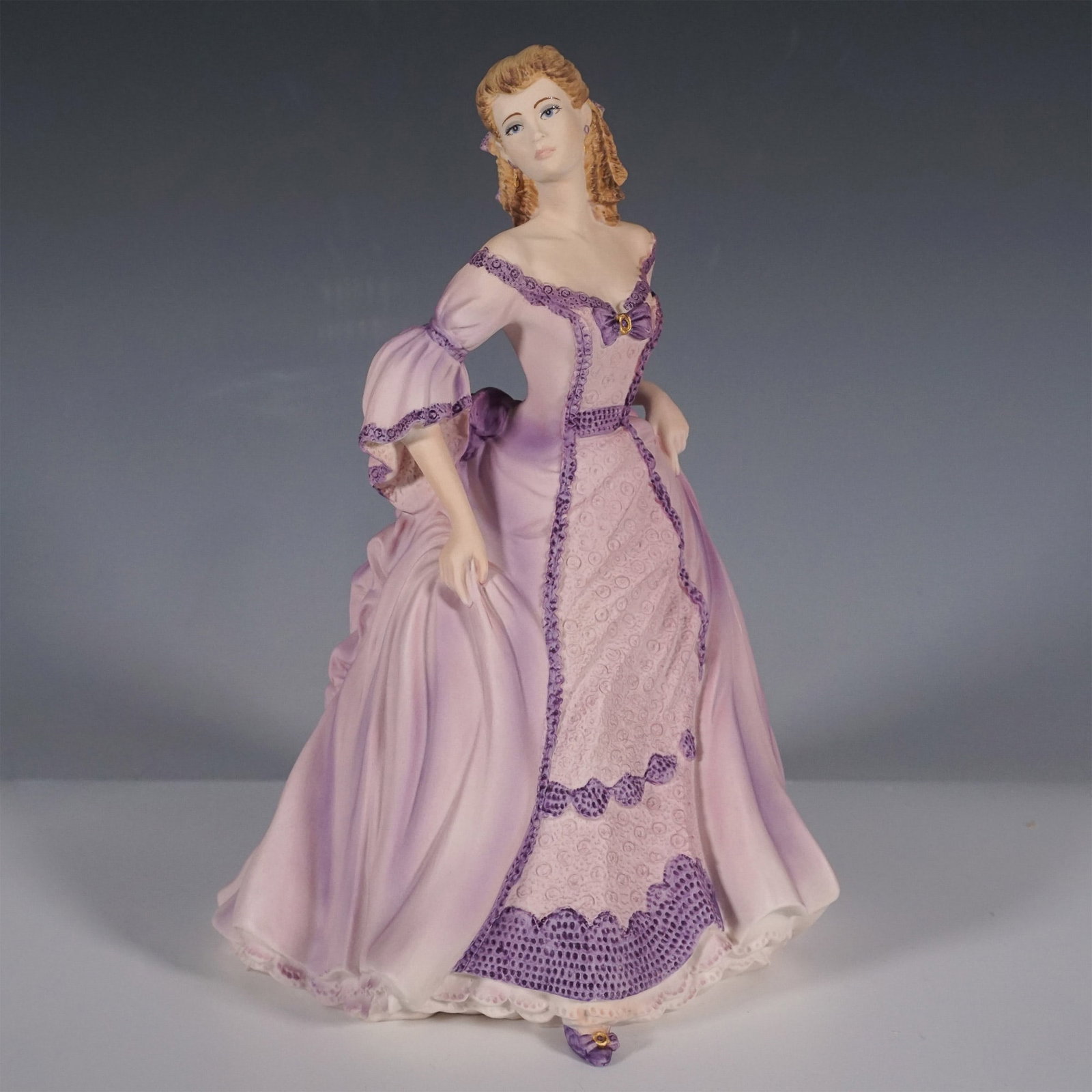 Coalport Figurine, Age of Elegance, Moonlit Rendezvous: Coalport's Moonlit Rendezvous is part of the prestigious Age of Elegance collection, embodying timeless grace and refined detail. Released in 1993, this exquisite figurine is crafted from fine bone ch