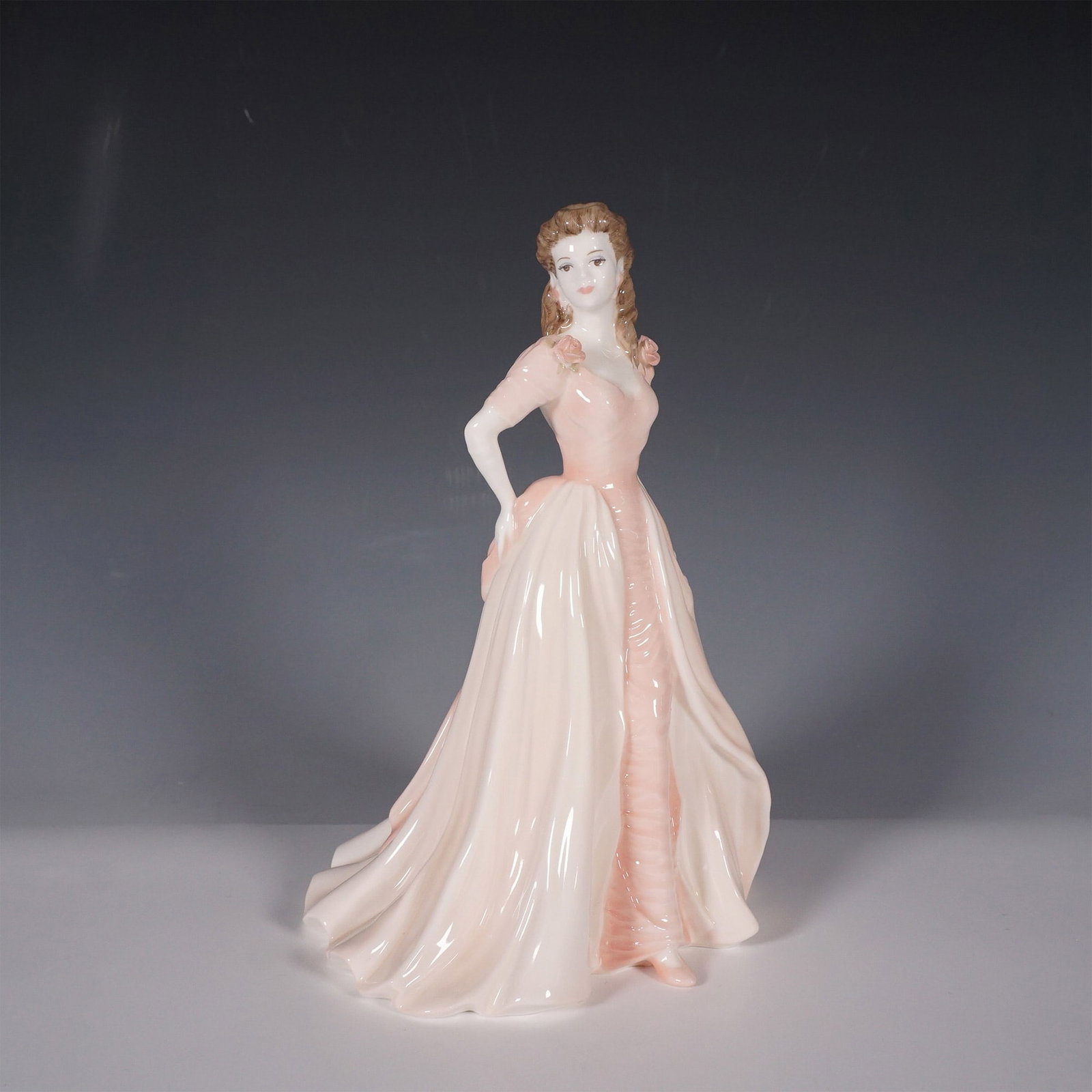 Coalport Ladies of Fashion Jacqueline Figurine, Limited Ed.: A finely crafted Coalport bone china figurine titled Jacqueline from the Ladies of Fashion series. Designed by Jack Glynn, this elegant figure was issued in 1995 as part of a limited edition collectio