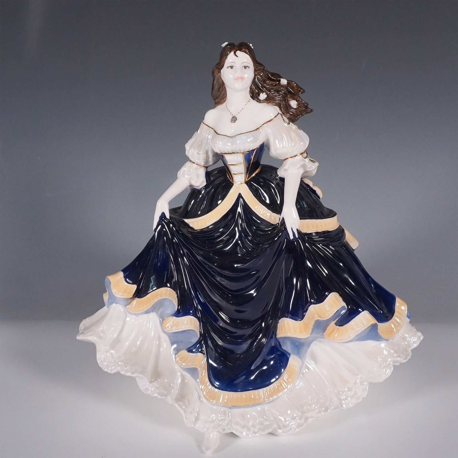 Coalport Literary Heroines Figurine, Lorna: A distinguished limited edition figurine from the Literary Heroines Collection. Inspired by the 1869 novel 'Lorna Doone: A Romance of Exmoor' by R. D. Blackmore, this figurine captures the grace and c