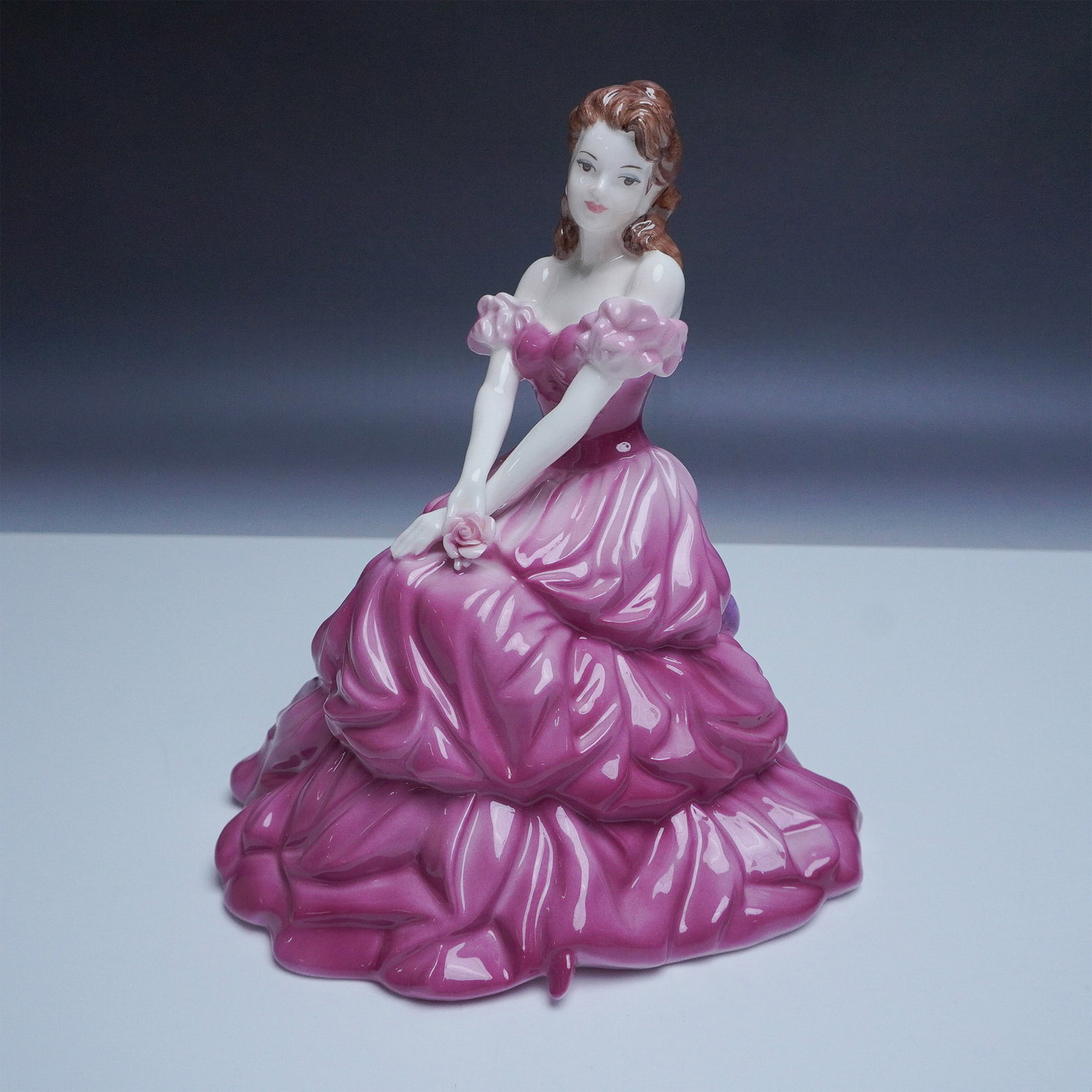 Coalport The Collingwood Collection Mary Figurine: This exquisite Coalport bone china figurine, titled Mary, is part of The Collingwood Collection and was issued exclusively for Coalport Collector Members in 1995. Designed by Jack Glynn, this elegant 