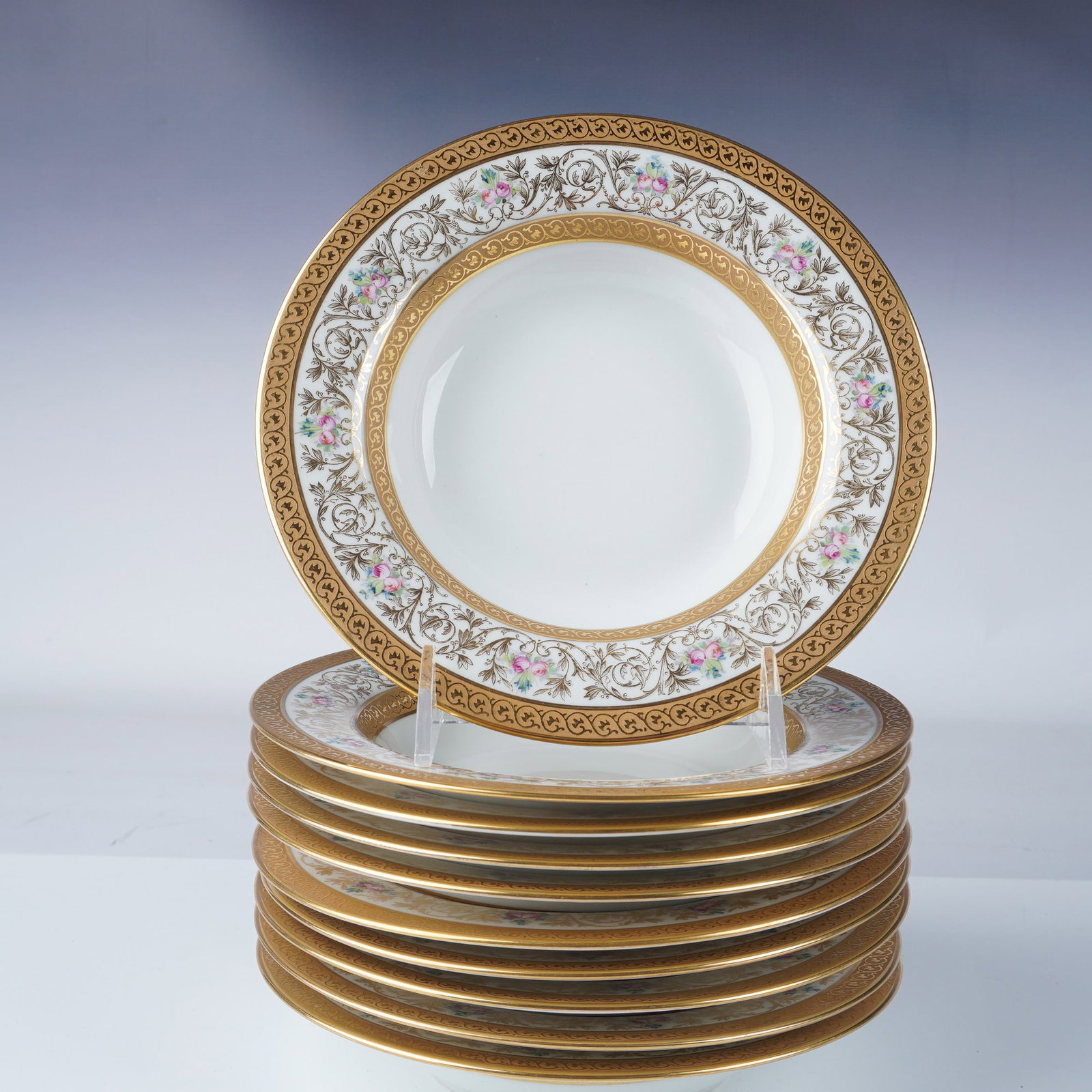 10pc Wm. Guerin & Co. Limoges Floral Gilt Soup Bowls: Elegant set of 10 porcelain soup bowls designed by Wm. Guerin & Co. from Limoges, France. Each bowl features a beautifully detailed floral and gilt border, showcasing exquisite craftsmanship and a tim