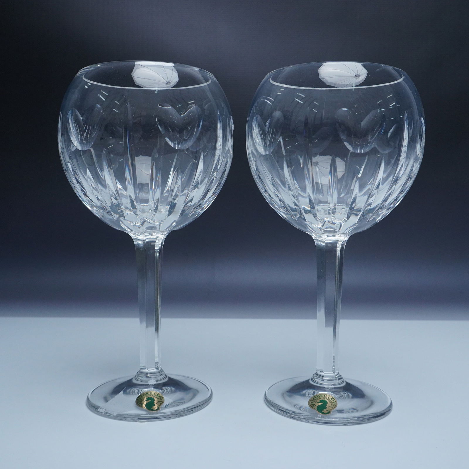 2pc Waterford Crystal Millennium Toasting Goblets - Love: A pair of exquisite Waterford Crystal toasting goblets from The Millennium Collection. These goblets, crafted from the finest crystal, feature an intricate cut design that elegantly catches the light.