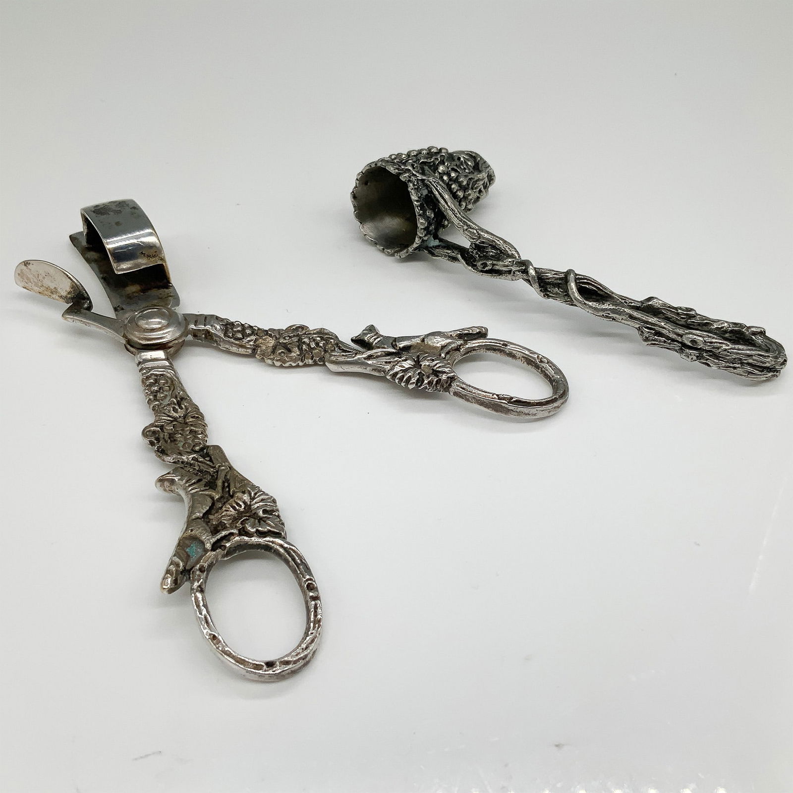 Pair of Ornate Silver Candle Snuffers (1 of 3)