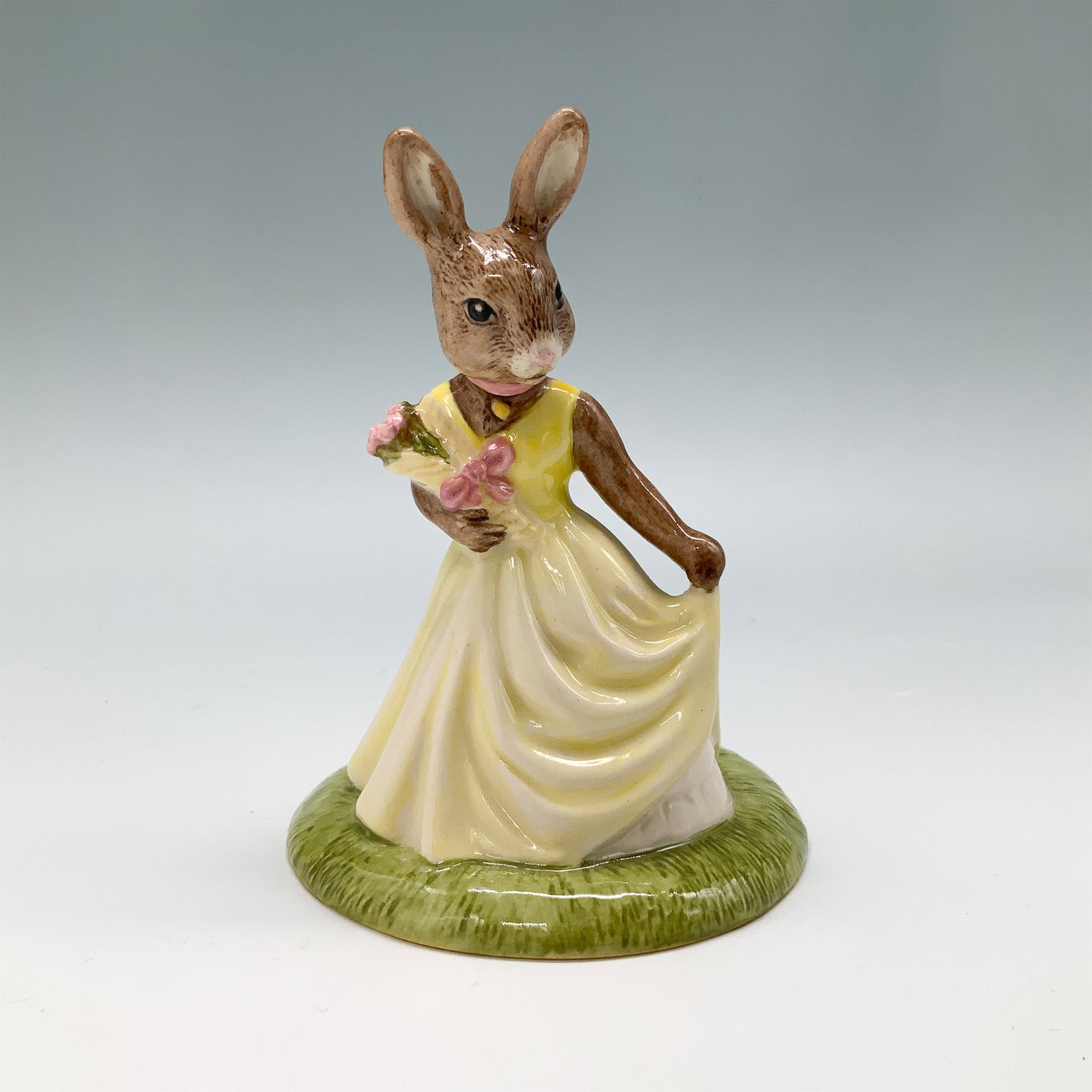 Royal Doulton Bunnykins Figurine, With Love Bunny DB269: The figurine is crafted from fine bone china and bears the Royal Doulton backstamp, ensuring its authenticity. It comes complete with its original box, making it an excellent addition to any Bunnykins