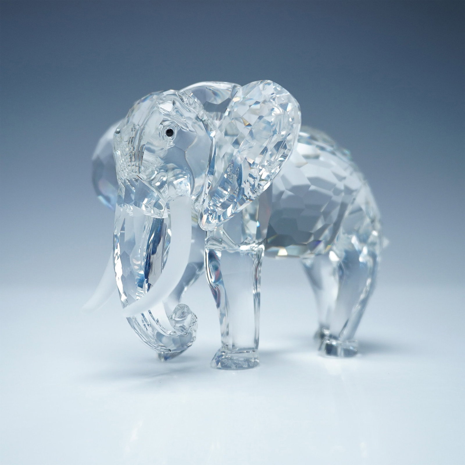 Swarovski SCS Inspiration Africa Elephant, Annual Edition 1993: This Swarovski SCS crystal figurine, Inspiration Africa - The Elephant, was released in 1993 as the final piece of the Inspiration Africa trilogy. Designed by Martin Zendron, this striking elephant sh