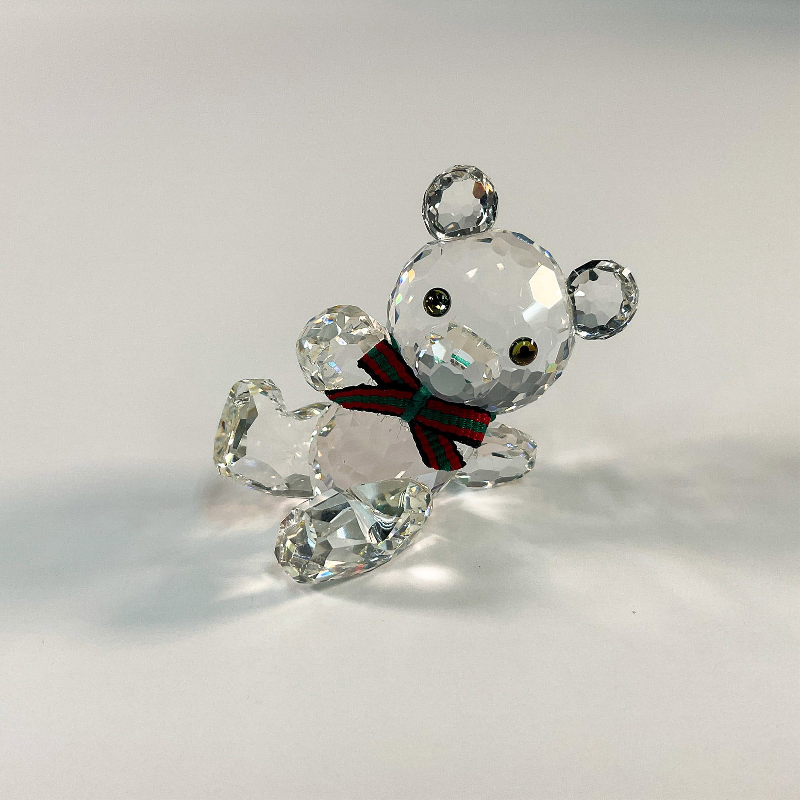 Swarovski Crystal Figurine, Kris Bear: Part of the When We Were Young theme. Features the iconic Swarovski Crystal figurine, Kris Bear, renowned as the very first Kris Bear design introduced by Swarovski. This groundbreaking piece marks a 