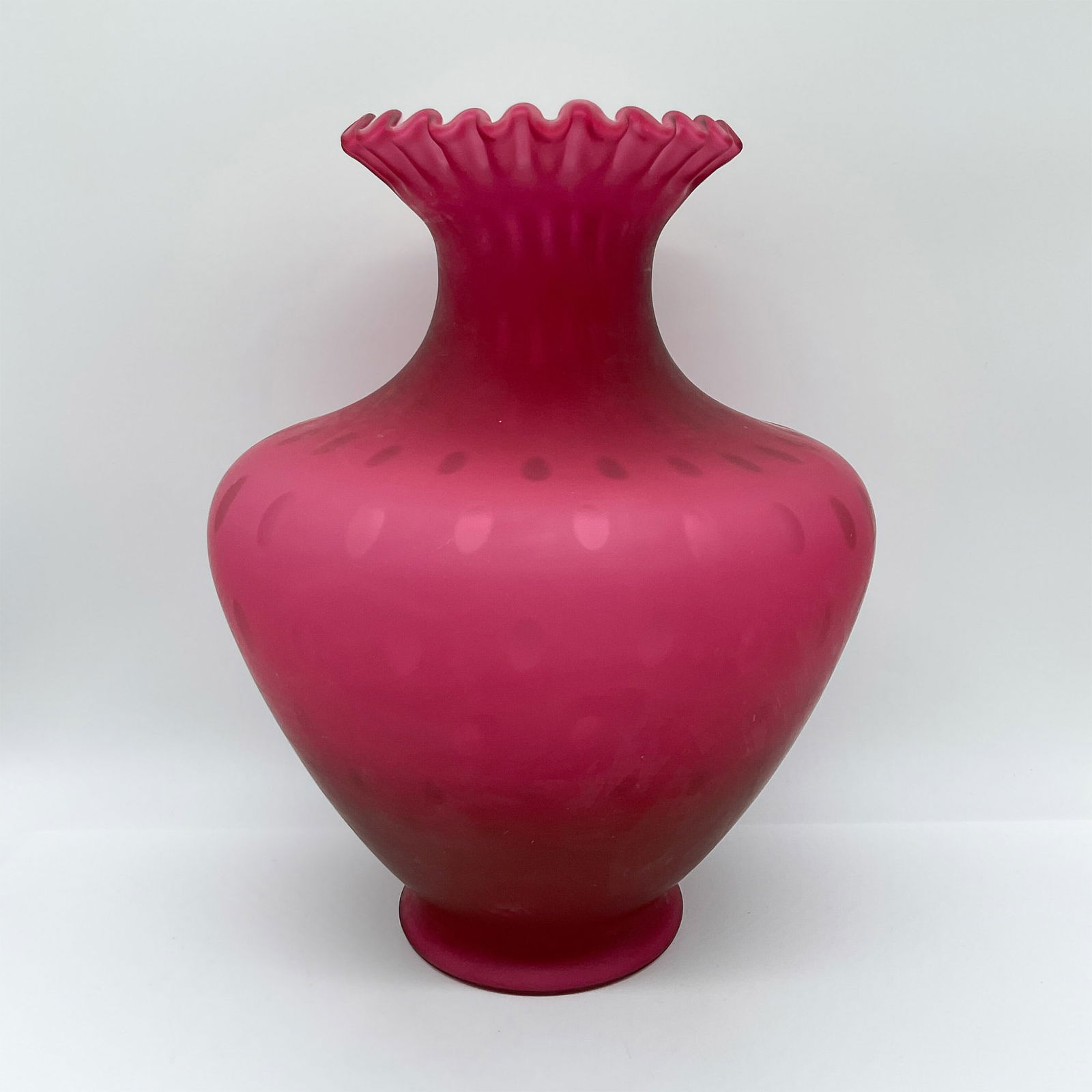 Pink Satin Glass Vase, Polka Dot Pattern: This elegant satin glass vase features a striking pink hue with an etched polka dot pattern, offering a blend of modern and vintage appeal. The flared ruffled rim adds a touch of sophistication, enhan