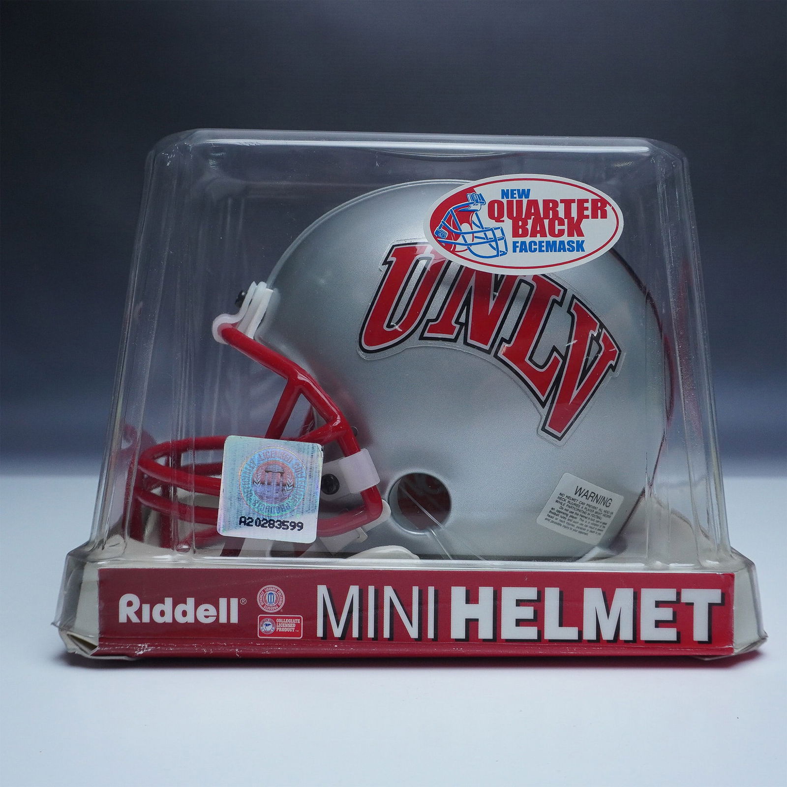 Riddell Football Mini Helmet, UNLV Signed by Randall Cunningham (1 of 5)