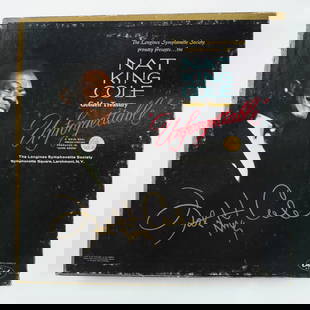 Nat King Cole Vinyl Record Set, Unforgettable, Longines Symphonette: A vintage vinyl record set titled Nat King Cole Golden Treasury - Unforgettable, produced by the Longines Symphonette Society. This special edition compilation features iconic songs by the legendary j