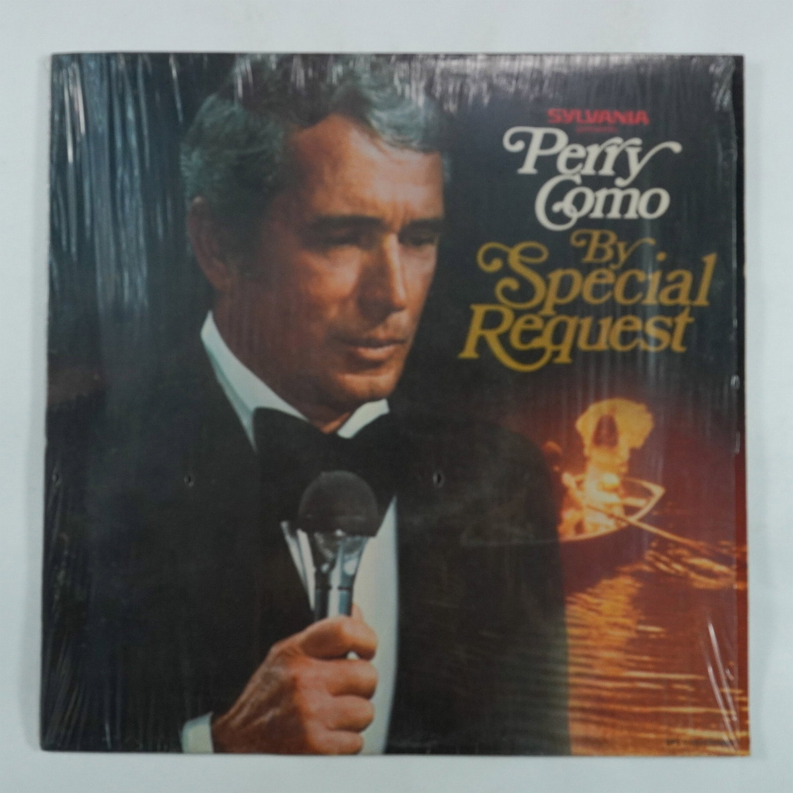 Perry Como By Special Request Vinyl Record Album: This vintage Perry Como vinyl record album, titled By Special Request, was released under the RCA Records label and produced for Sylvania Products. Known for his smooth baritone voice and relaxed voca