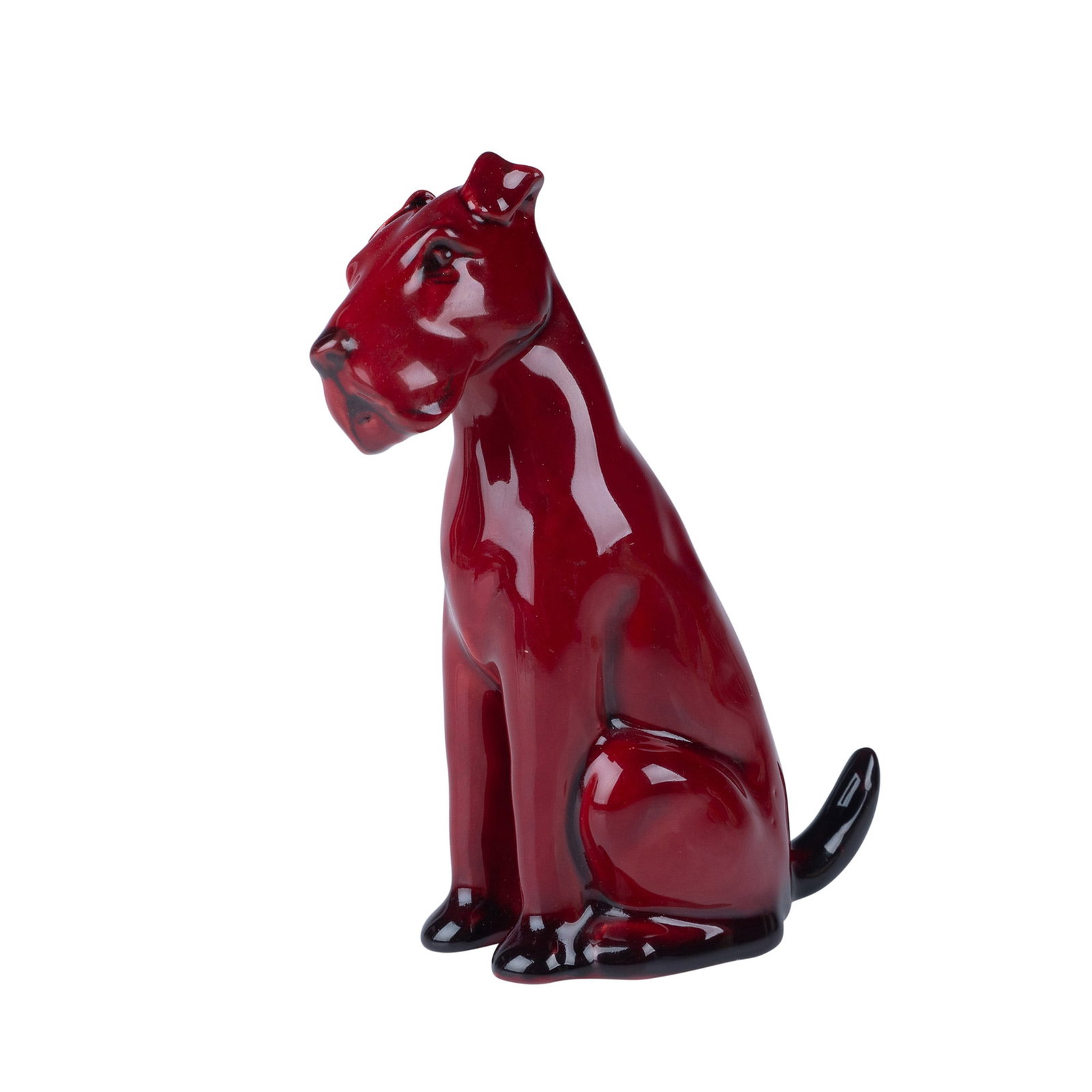 Royal Doulton Flambe Figurine, Fox Terrier Seated HN924: A striking Royal Doulton Flambe seated fox terrier figurine, featuring the brand's signature deep red glaze. This sleek and elegant representation captures the poised and alert stance of the beloved b