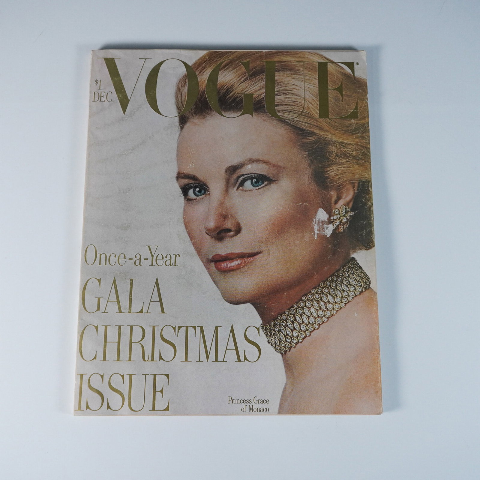 Vintage Vogue Magazine, December 1971 Gala Issue: A vintage Vogue magazine from December 1971, featuring the Gala Christmas Issue with Princess Grace of Monaco on the cover. This issue includes high-fashion editorials, beauty advertisements, and cult
