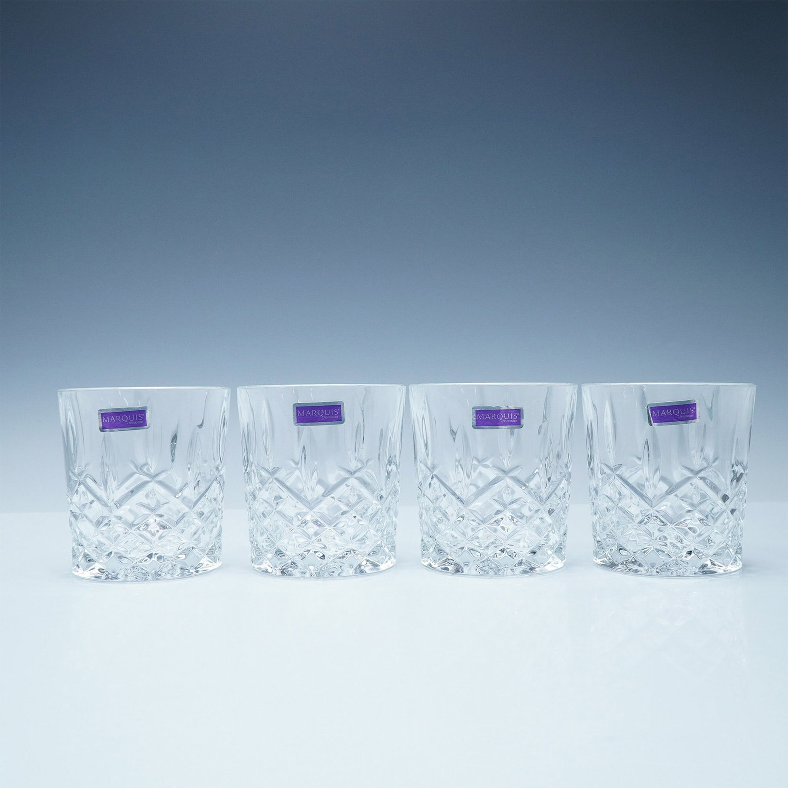4pc Old Fashioned Glasses, Marquis by Waterford Markham: A set of four Marquis by Waterford Old Fashioned glasses in the Markham pattern, featuring a striking cross-cut design and brilliant clarity. Each glass stands 3.75"H, perfect for whiskey, cocktails, 