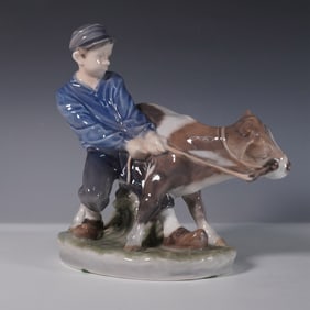 Royal Copenhagen Porcelain Figurine, Boy with Calf 772
